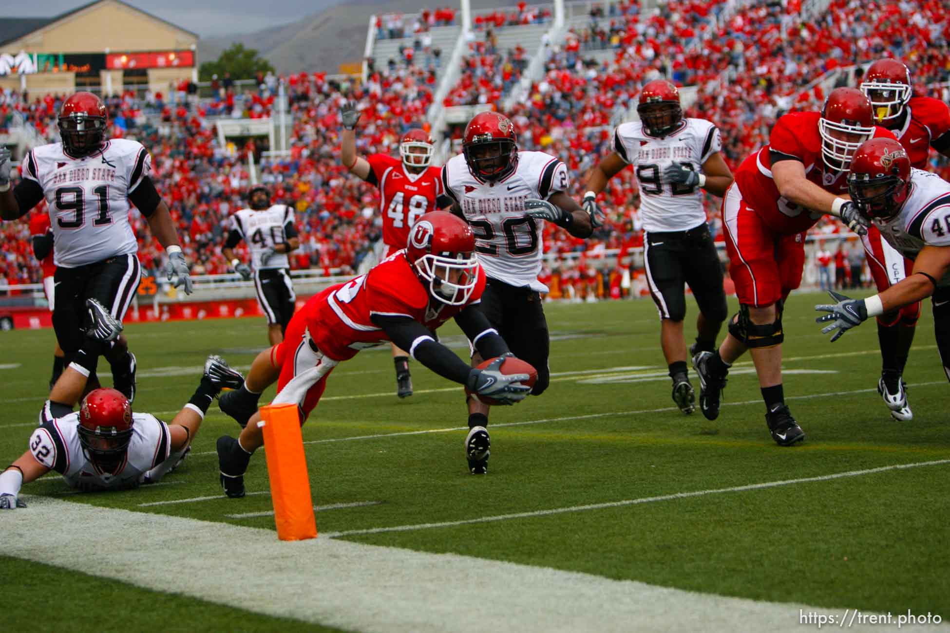 Salt Lake City - Utah's Derrek Richards dives into the end zone for what would have been a score, but a penalty nullified the play. Utah vs San Diego State (SDSU) college football at Rice-Eccles Stadium.