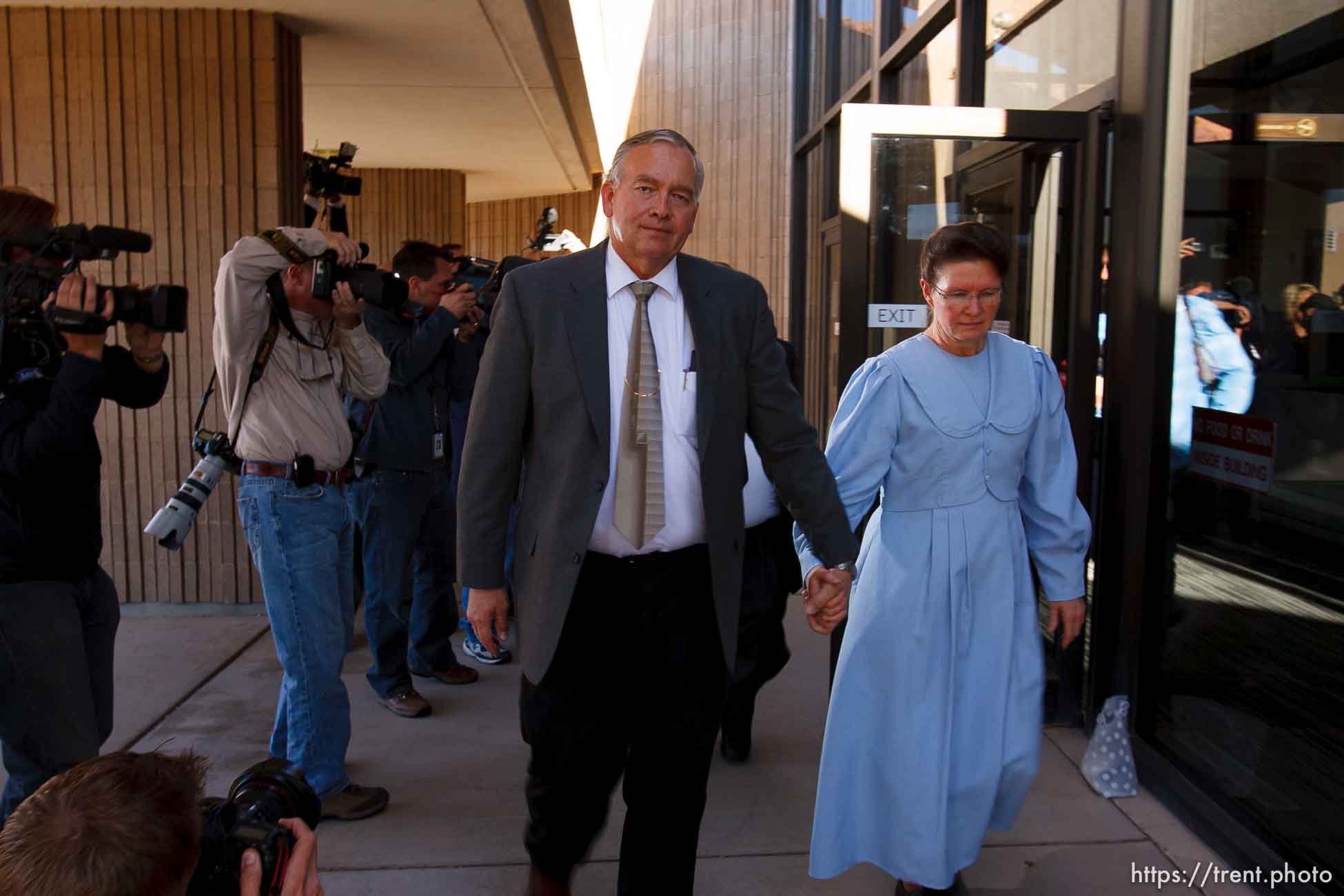 St. George - Lamar Johnson and an unidentified woman (would not give her name), supporters of Warren Jeffs, leave the 5th District Courthouse after the sentencing of polygamous sect leader Warren Jeffs. Jeffs was sentenced Tuesday to two consecutive counts of 5 years to life, November  20, 2007 after being found guilty on two counts of rape as an accomplice, in St. George, Utah. Jeffs, head of the Fundamentalist Church of Jesus Christ of Latter Day Saints, was found guilty of two counts of rape as an accomplice for allegedly coercing the marriage and rape of a 14-year-old follower to her 19-year-old cousin in 2001.