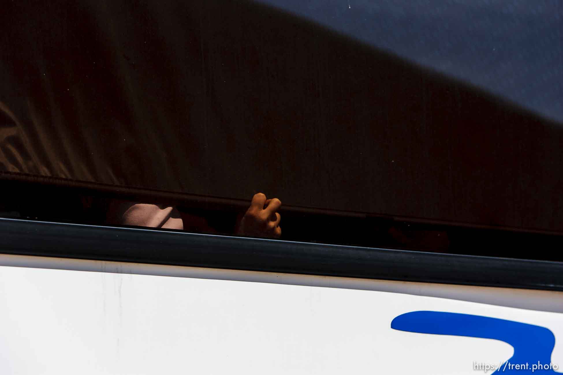 San Angelo - FLDS women and children from the YFZ Ranch are escorted by Texas Child Protective Services on buses to Fort Concho, Sunday, April 6, 2008.