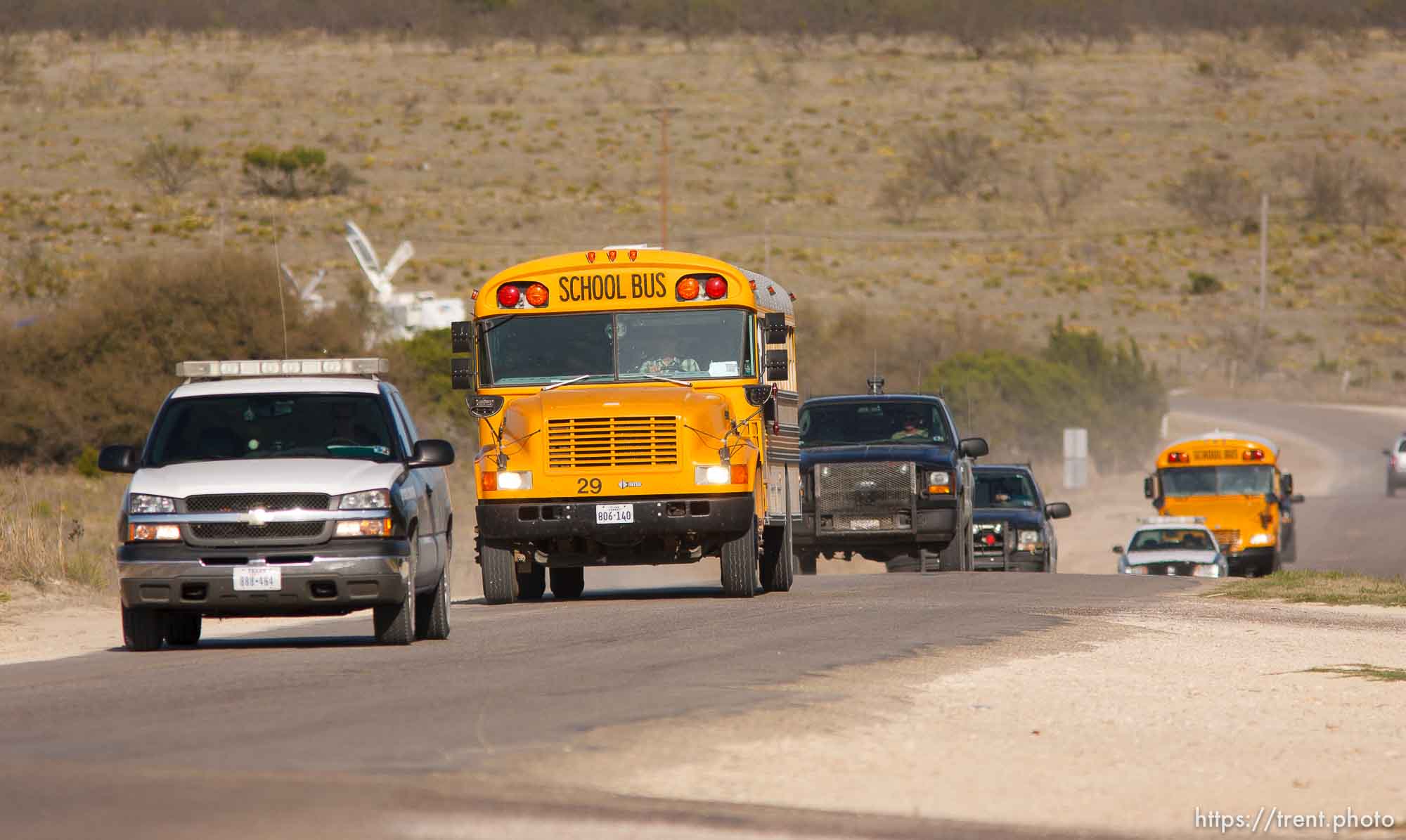 Eldorado - School buses carrying FLDS members taken from the YFZ Ranch on their way to Fort Concho in San Angelo, under police escort