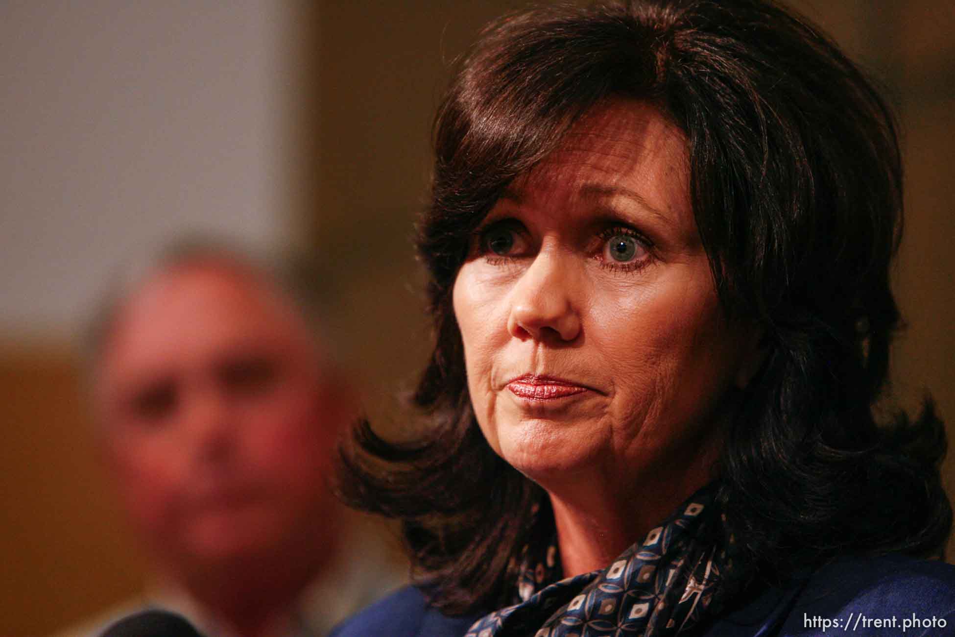 San Angelo - Marleigh Meisner, spokesperson for Texas Department of Family and Protective Services, speaks at a press conference near Fort Concho Tuesday, April 15, 2008. In the background is state representative Drew Darby..