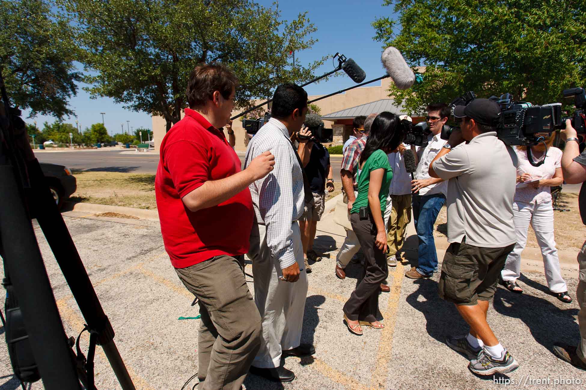 San Angelo - Attorney Jimmy Stewart is chased to his car by reporters as left a gathering of attorneys at the DFPS at the Ralph R. Chase building Sunday, June 1, 2008 to hammer out an agreement to return over 450 children that were taken from the YFZ ranch.