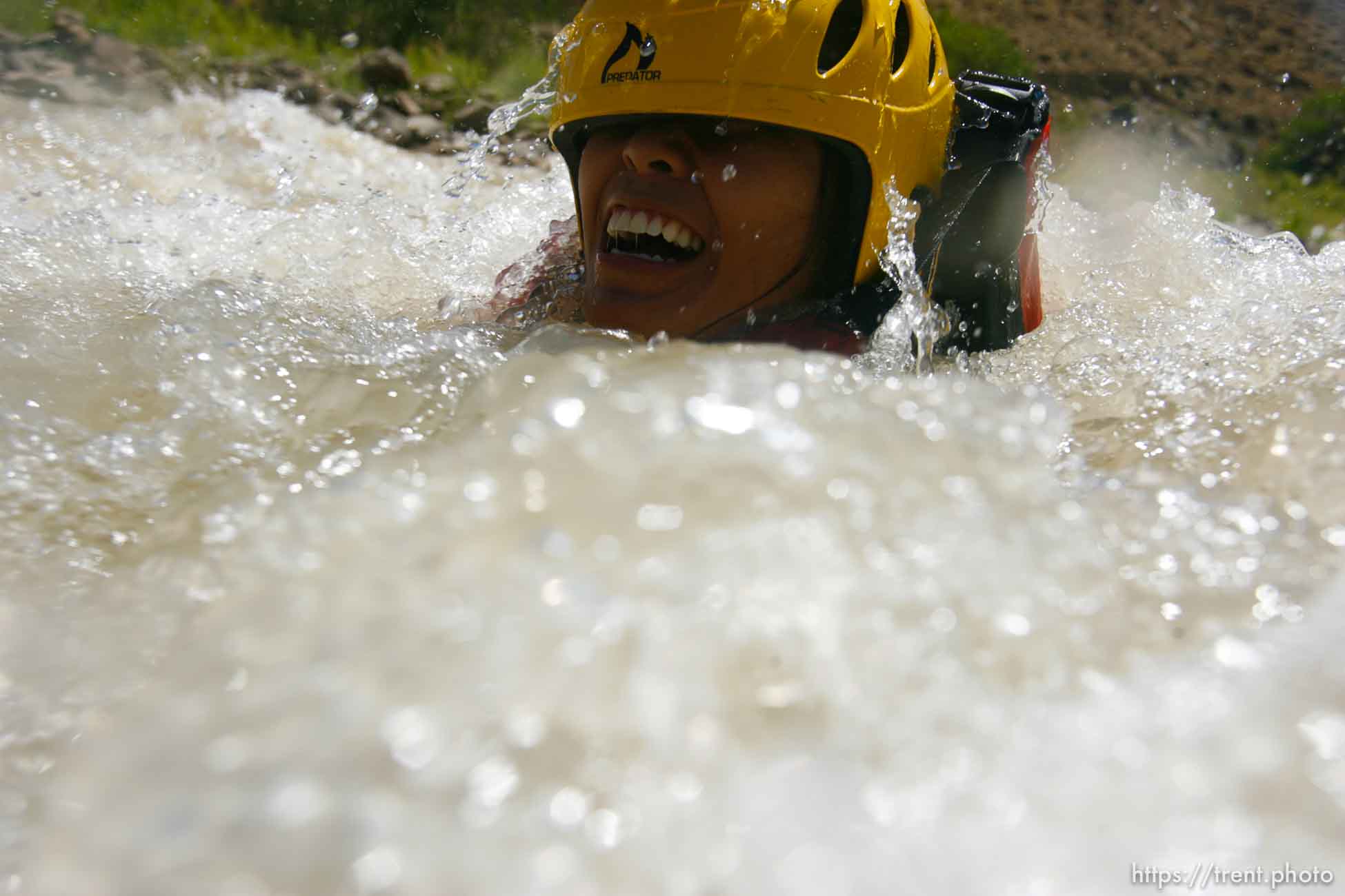 Kayaking at butler wash. maggie thach swimming the rapid