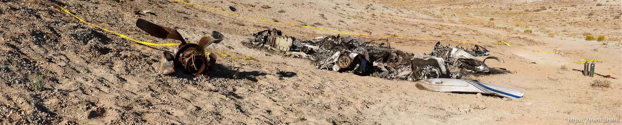 Moab - Ten people were killed when a 1975 Beechcraft King Air A-100 plane crashed about 2 miles from Canyonlands Field airport. They worked for Southwest Skin and Cancer/Red Canyon Aesthetics & Medical Spa Saturday August 23, 2008.
Photo by Trent Nelson/The Salt Lake Tribune; 08.23.2008