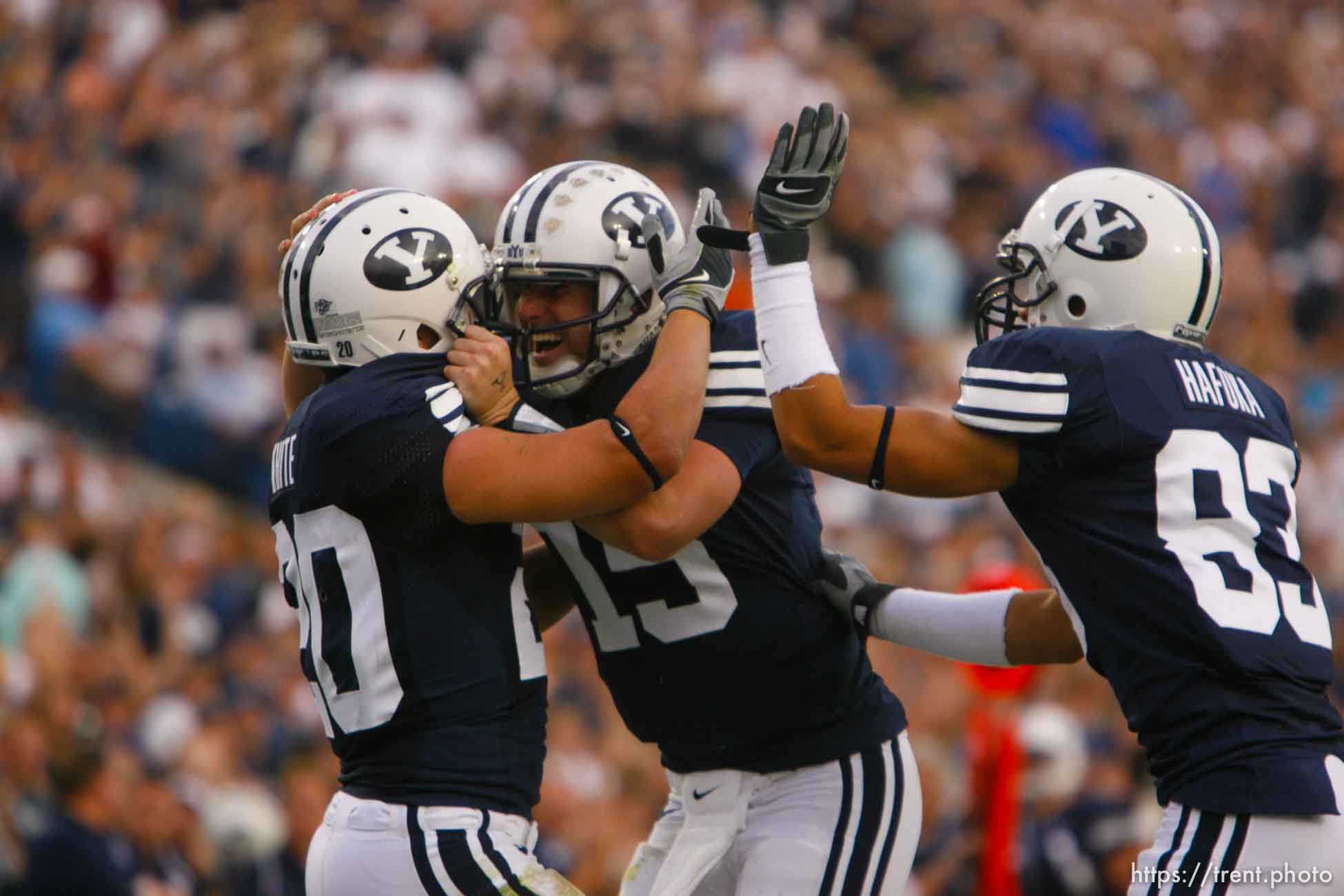 Provo - BYU vs. Northern Iowa college football Saturday, August 30, 2008 at Edwards Stadium. BYU wide receiver Reed White (20) BYU quarterback Max Hall (15) celebrate White's touchdown BYU wide receiver Spencer Hafoka (83)