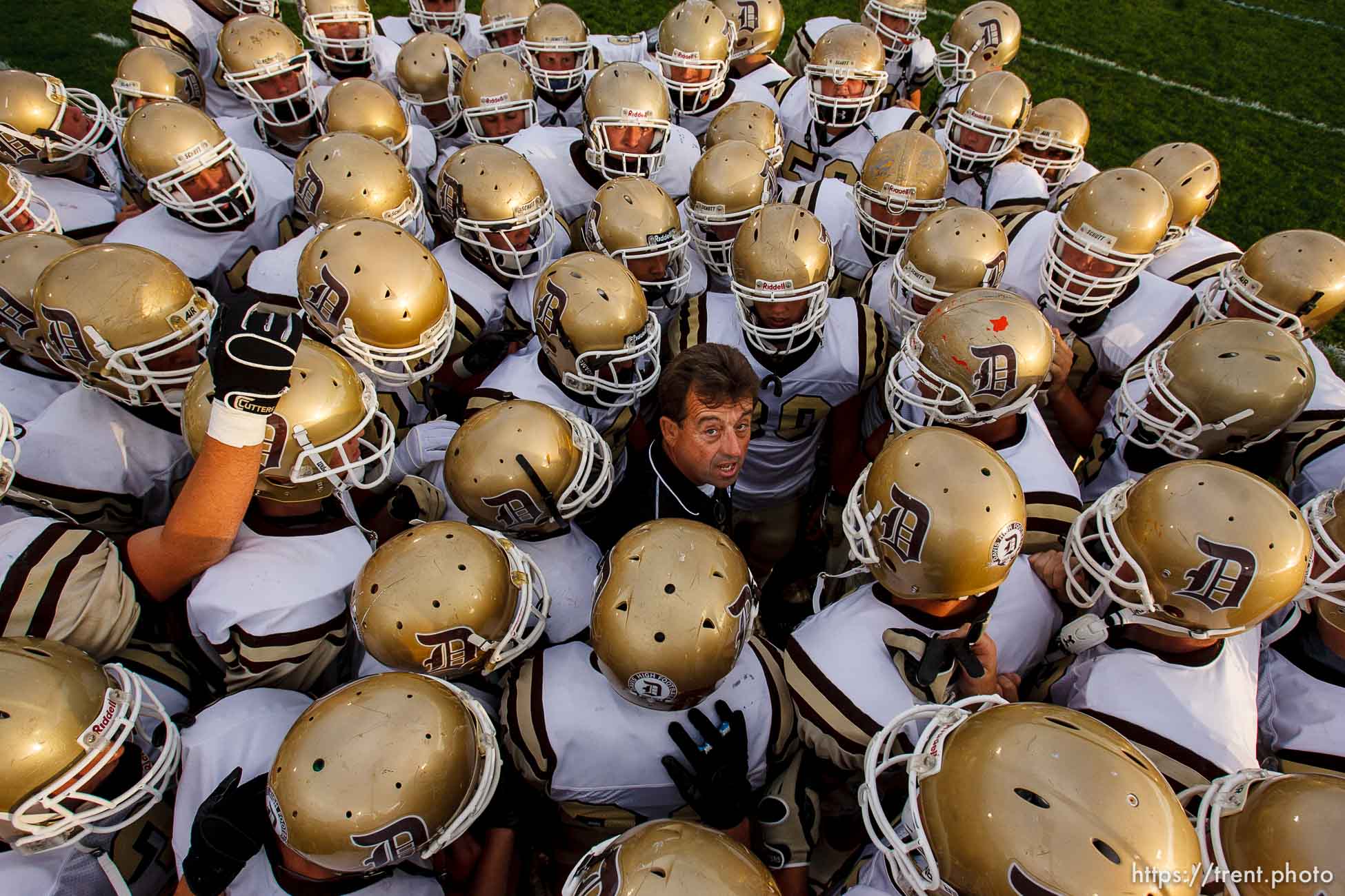 Layton - Layton vs. Davis high school football, Friday, September 19, 2008, at Layton. Davis coach Ryan Bishop in pre-game huddle