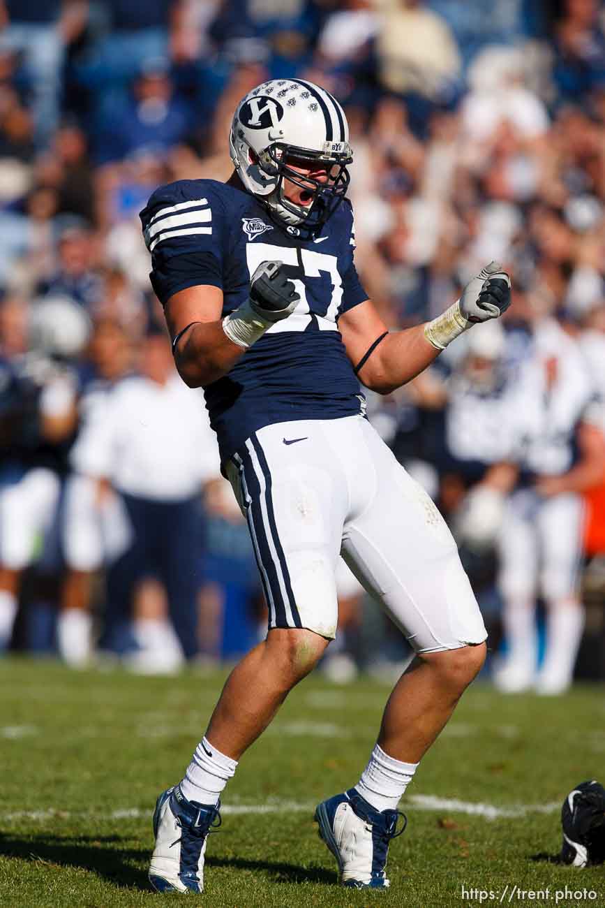 Provo - BYU defeats UNLV 42-35, college football at LaVell Edwards Stadium Saturday October 25, 2008.; 10.25.2008. BYU linebacker Matt Putnam (57) sacks UNLV's Omar Clayton in a key play of the game.