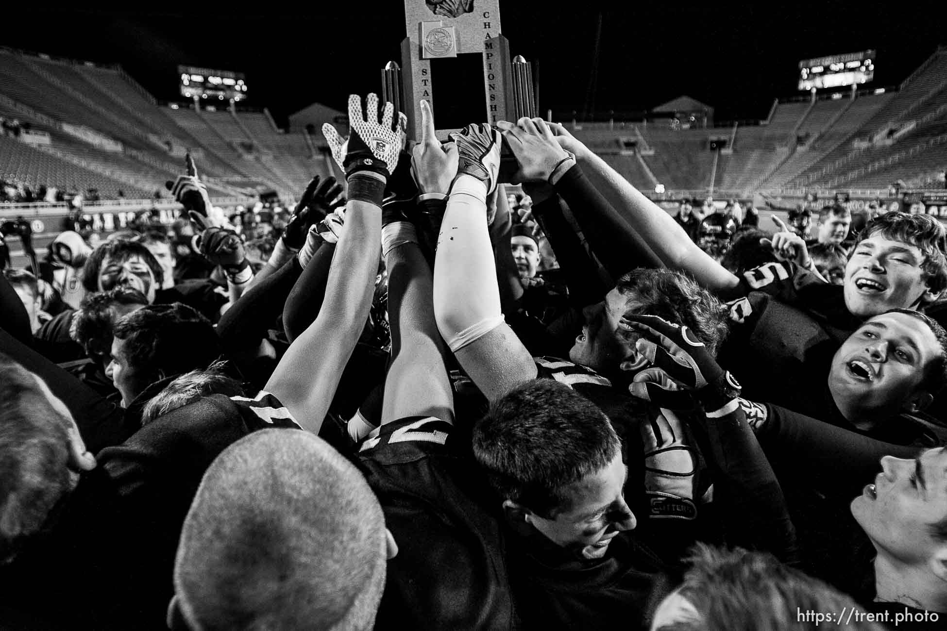 Salt Lake City - Bingham vs. Alta High School, 5A State Championship game Friday, November 21, 2008 at Rice-Eccles Stadium. Alta wins 21-17.. Friday November 21, 2008. trophy celebration