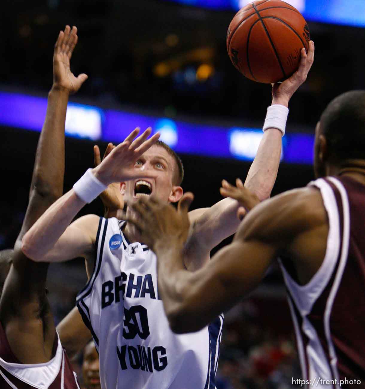 Philadelphia - BYU vs. Texas A&M college basketball, first round NCAA Division I Men's Basketball Championship at the Wachovia Center Thursday March 19, 2009. 
Brigham Young guard Lee Cummard (30) Texas A&M's Chinemelu Elonu (41)