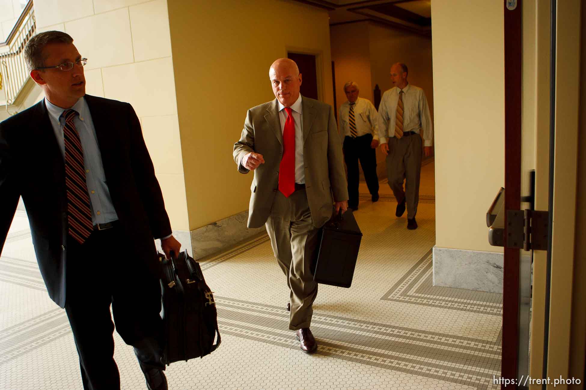 Bill Richards (assistant Arizona attorney general), Bruce Wisan, Jerry Jensen (assistant Utah attorney general), and Tim Bodily (assistant Utah attorney general).