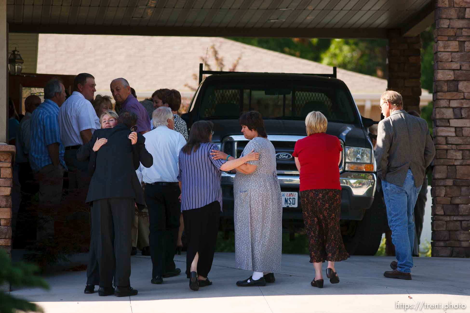 Blanding - Hundreds turned out to the San Juan Mortuary Monday evening, June 15, 2009 to pay their respects at the viewing of Blanding physician James Redd, who took his own life after being charged with a felony count of trafficking in archaeological artifacts protected by federal law.