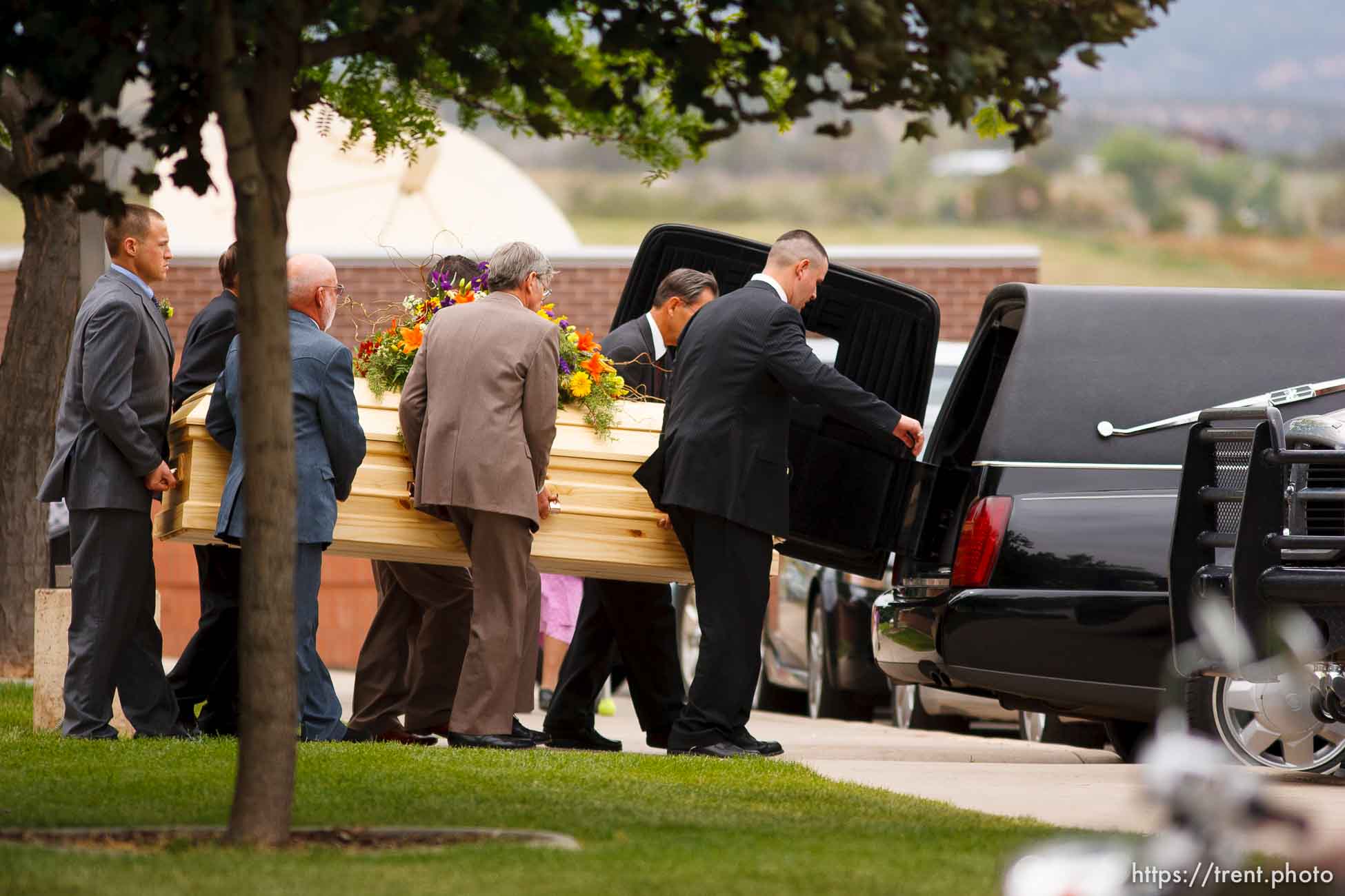 Blanding - Hundreds turned out to the LDS Stake Center in Blanding Tuesday, June 16, 2009 to pay their respects at the funeral of physician James Redd, who took his own life after being charged with a felony count of trafficking in archaeological artifacts protected by federal law.