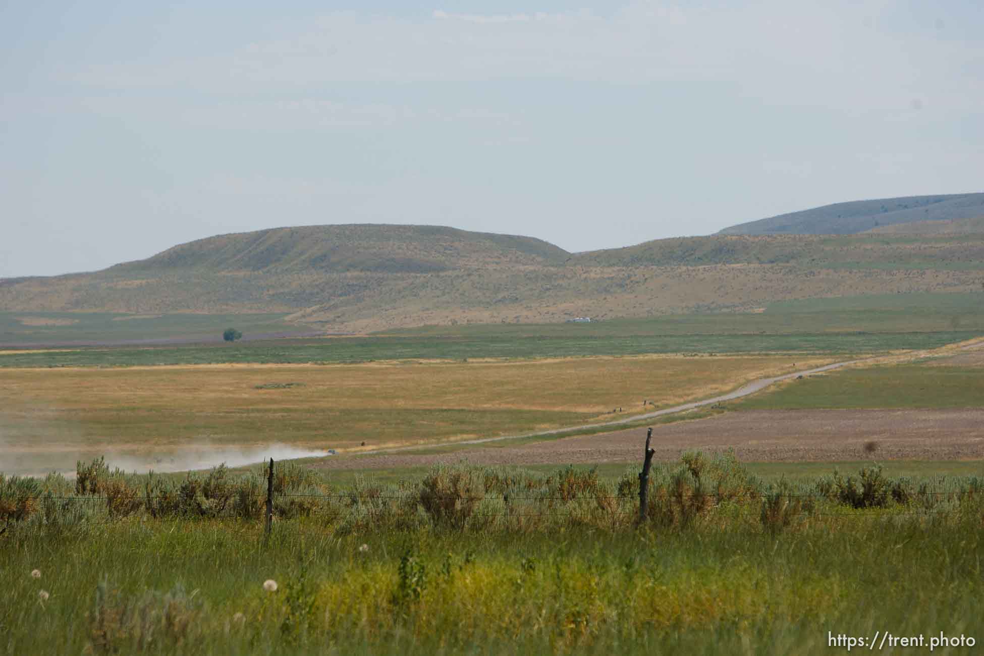 Washakie - Leland Pubigee, an elder in the Northwestern Band of the Shoshone, has died. This is the address of the North Stake Center (LDS), where his funeral will be. Leland will be buried at the Washakie Cemetery, an isolated dry patch that is part of the 400 acres the Northwestern Band has near the Idaho border, the last of its ancestral lands.  Saturday, July 18, 2009.
dirt road