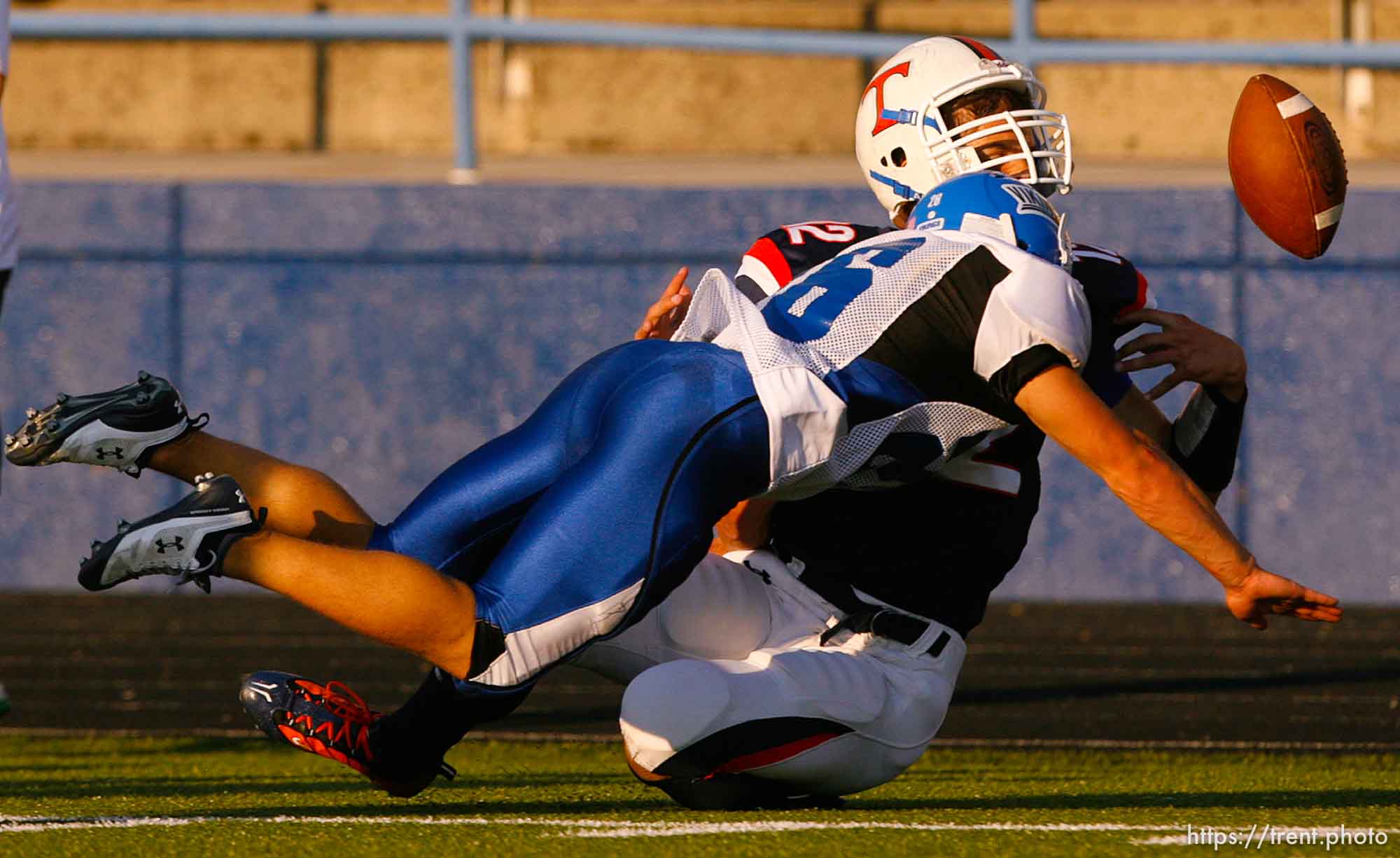 Provo - PG's Jeff Harris knocks Timpview quarterback Trevor Brown out of bounds. Timpview vs. Pleasant Grove high school football Friday, August 21 2009..
Trent Nelson/The Salt Lake Tribune; 8.21.2009