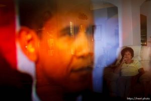 North Salt Lake - Reflected in her television screen, Margaret Johnson watches President Barack Obama addressing Congress about health reform, Wednesday, September 9 2009.