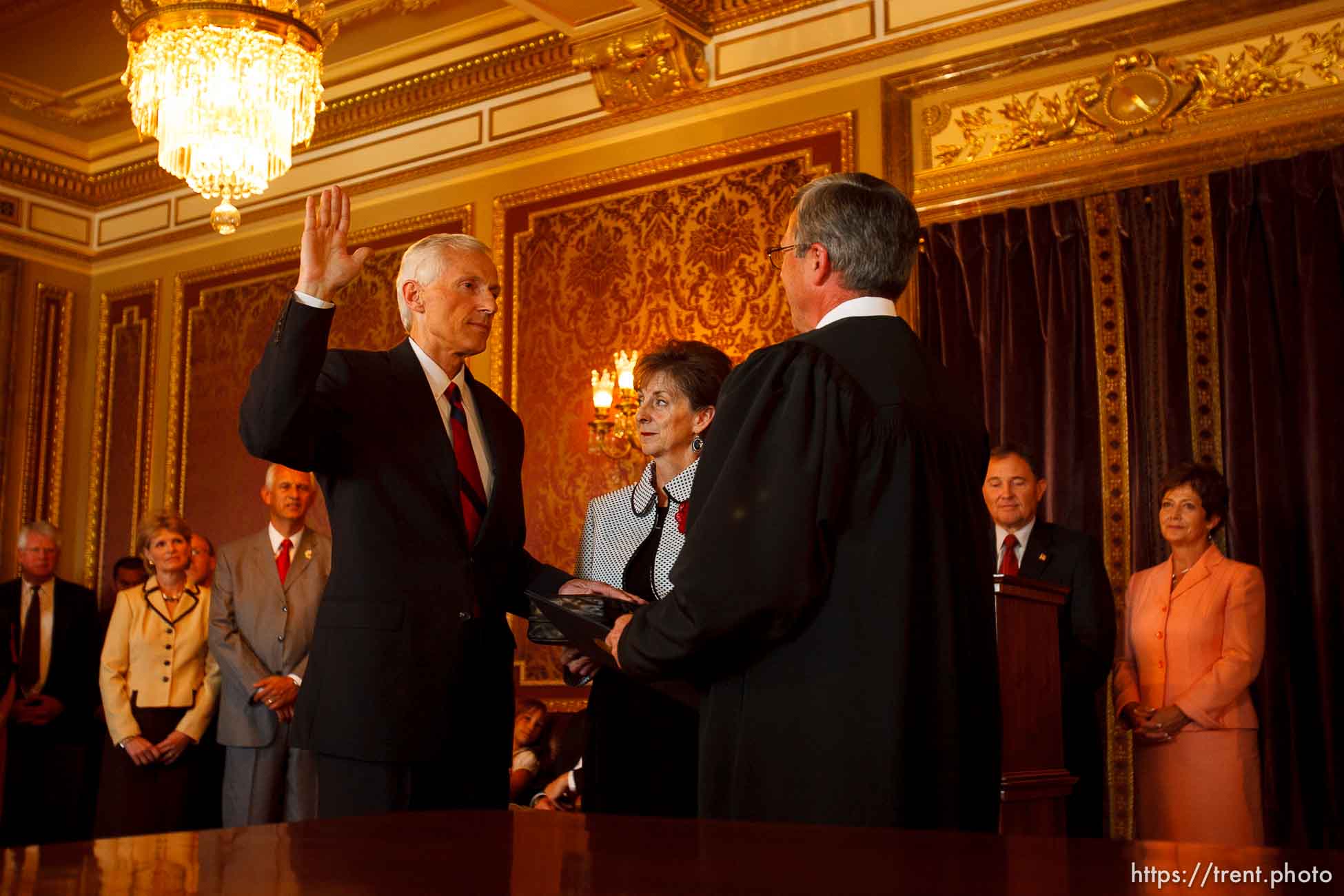 Salt Lake City - Greg Bell is sworn in as the state's Lieutenant Governor Tuesday, September 1 2009 at the State Capitol. With him is his wife, JoLynn Bell and Judge David Connors.