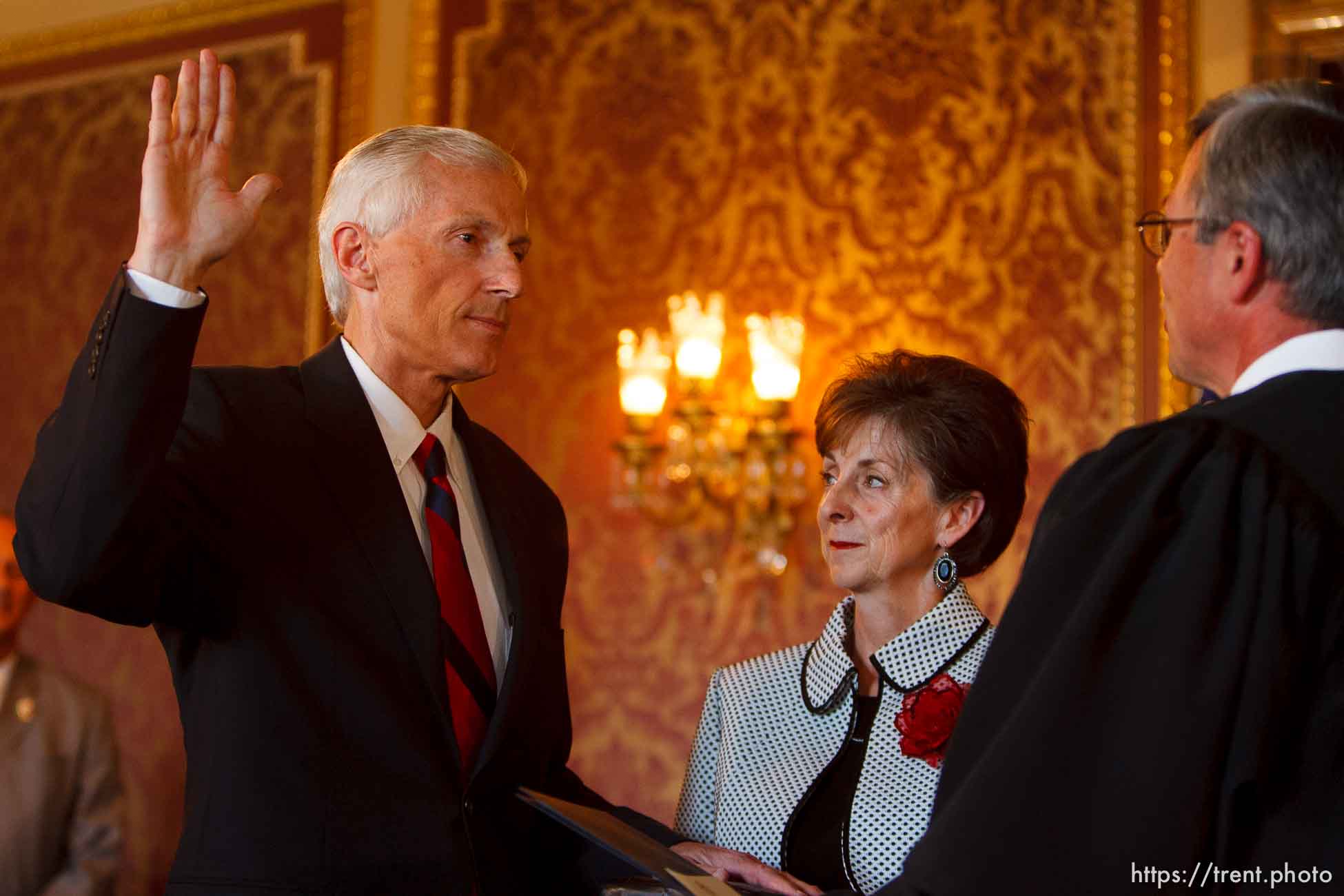 Salt Lake City - Greg Bell is sworn in as the state's Lieutenant Governor Tuesday, September 1 2009 at the State Capitol. With him is his wife, JoLynn Bell and Judge David Connors.