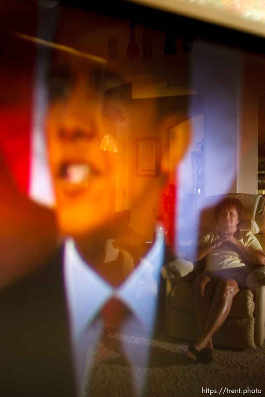 North Salt Lake - Reflected in her television screen, Margaret Johnson watches President Barack Obama addressing Congress about health reform, Wednesday, September 9 2009.