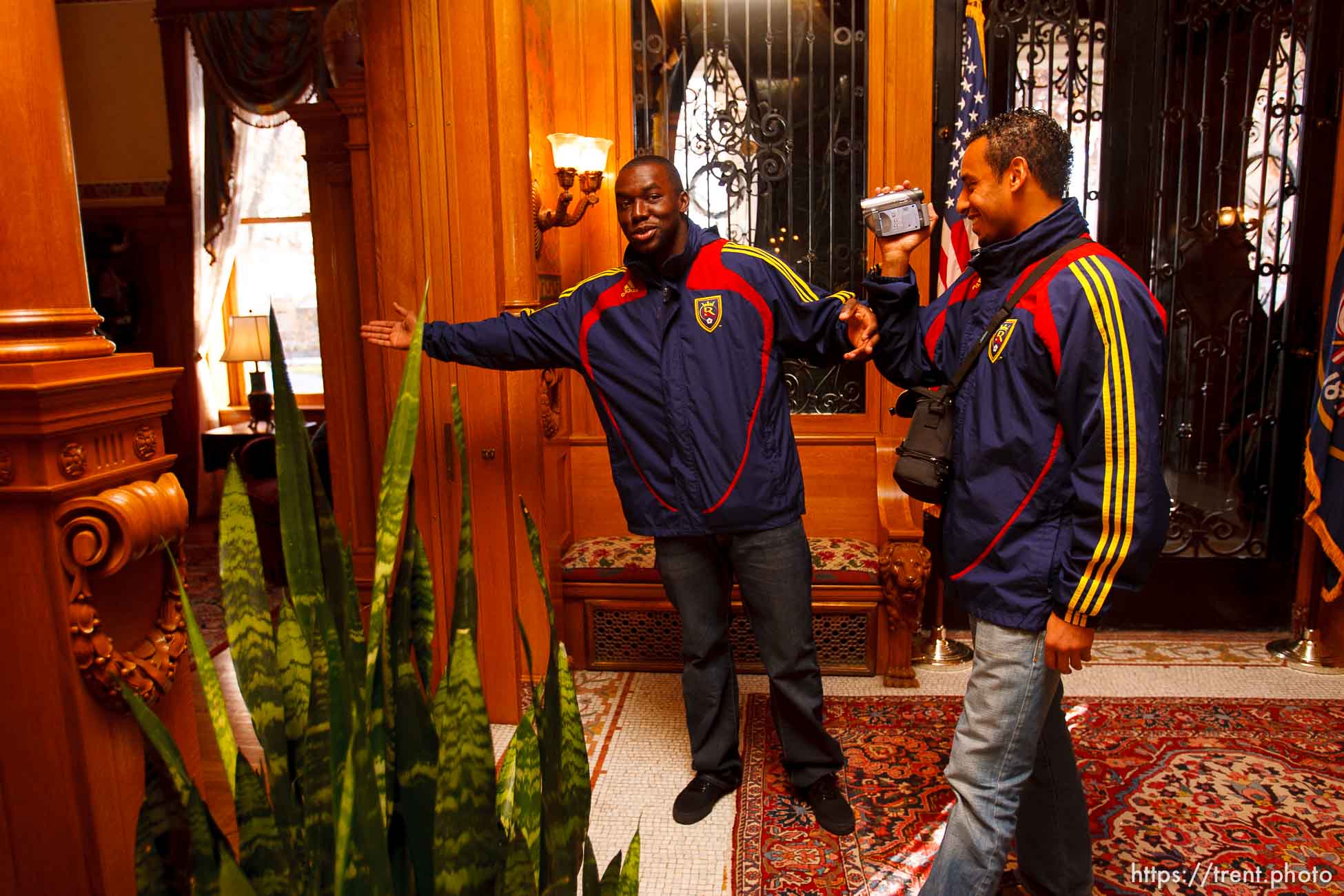 Jean Alexandre and Rachid El Khalifi (right) take an impromptu video tour of the Governor's Mansion after a luncheon Tuesday, November 24 2009.