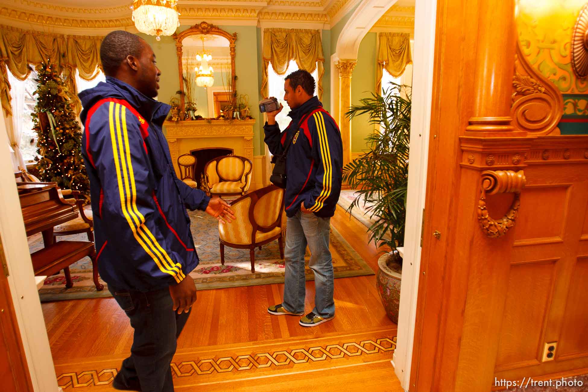 Jean Alexandre and Rachid El Khalifi (right) take an impromptu video tour of the Governor's Mansion after a luncheon Tuesday, November 24 2009.