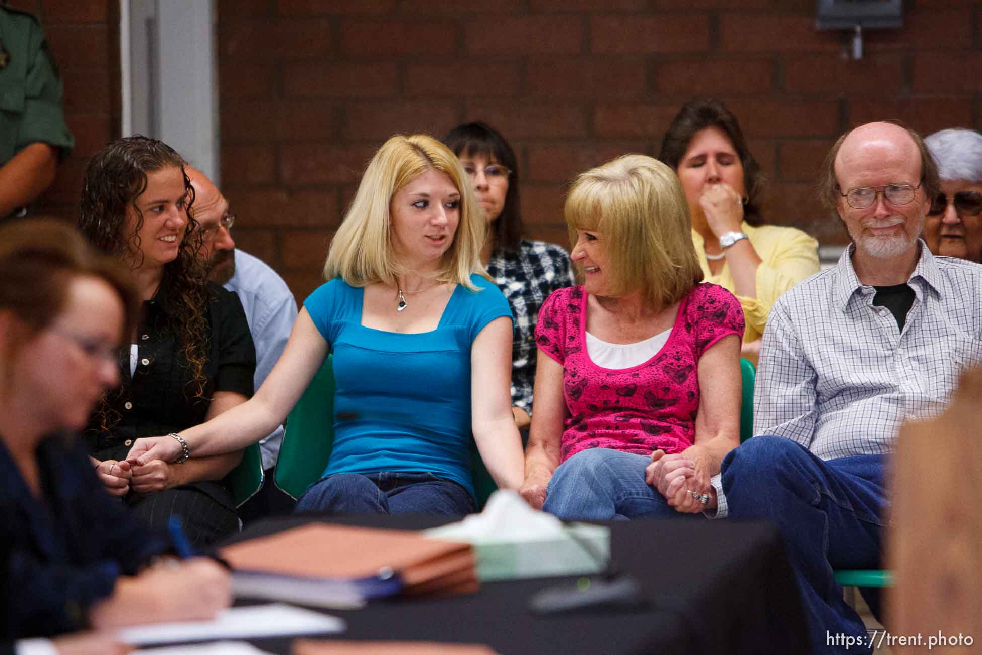 Trent Nelson  |  The Salt Lake Tribune
Draper - Family members of Nicolas G. Kirk, a deputy shot by Ronnie Lee Gardner, react as the Utah Board of Pardons and Parole announced their unanimous decision to deny Ronnie Lee Gardner's request for commutation Monday, June 14, 2010. He is scheduled to be executed by firing squad Friday. Left to right, front row, Jamie Stewart (granddaughter), Mandi Hull (granddaughter), Barb Webb (daughter). Left to right, back row, Doug Fawson (director of victim services, department of corrections), Tammie Atkin (victim advocate, Utah Attorney General's Office), Tami Stewart (daughter).