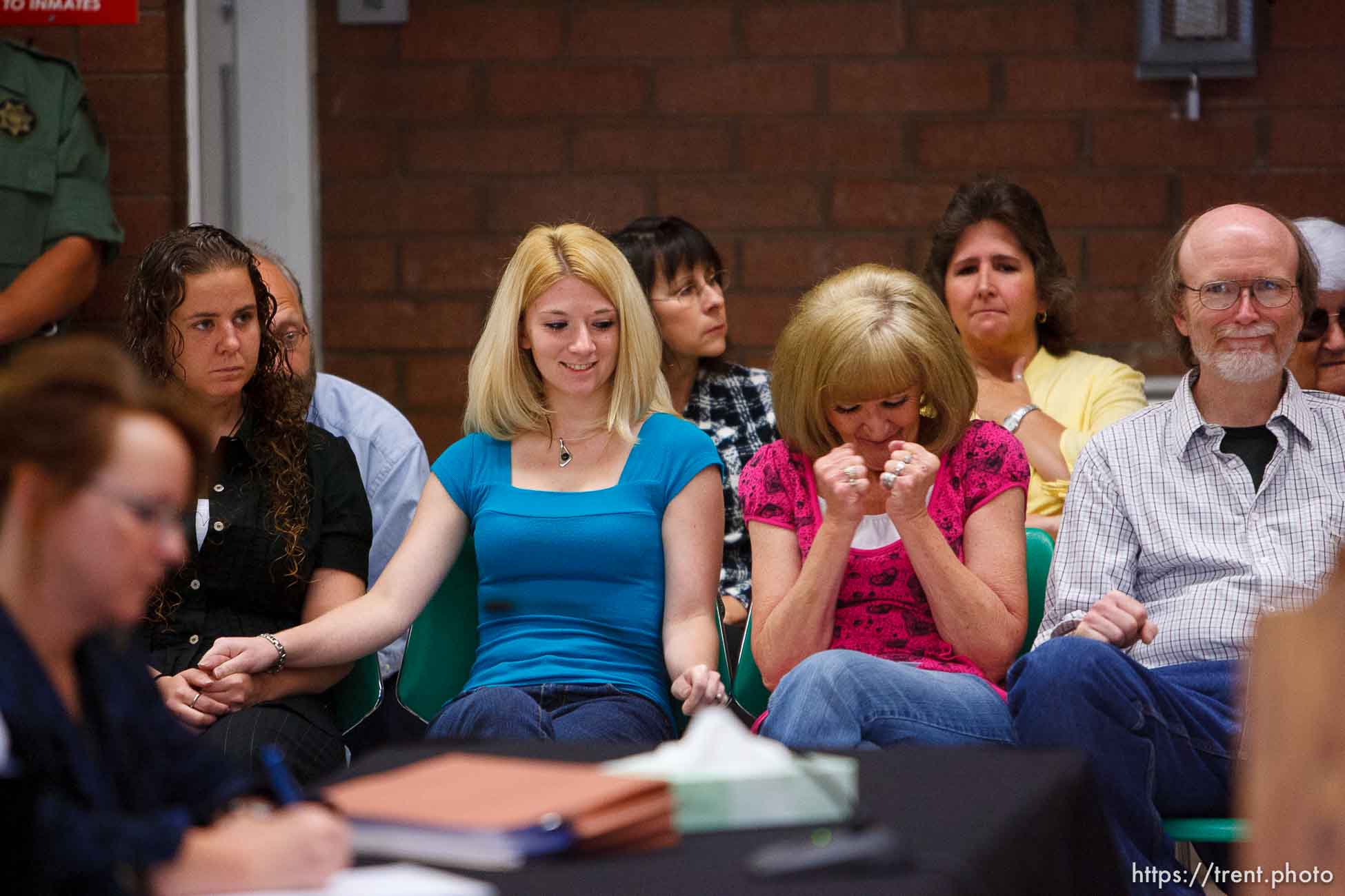 Trent Nelson  |  The Salt Lake Tribune
Draper - Family members of Nicolas G. Kirk, a deputy shot by Ronnie Lee Gardner, react as the Utah Board of Pardons and Parole announced their unanimous decision to deny Ronnie Lee Gardner's request for commutation Monday, June 14, 2010. He is scheduled to be executed by firing squad Friday. Left to right, front row, Jamie Stewart (granddaughter), Mandi Hull (granddaughter), Barb Webb (daughter). Left to right, back row, Doug Fawson (director of victim services, department of corrections), Tammie Atkin (victim advocate, Utah Attorney General's Office), Tami Stewart (daughter).