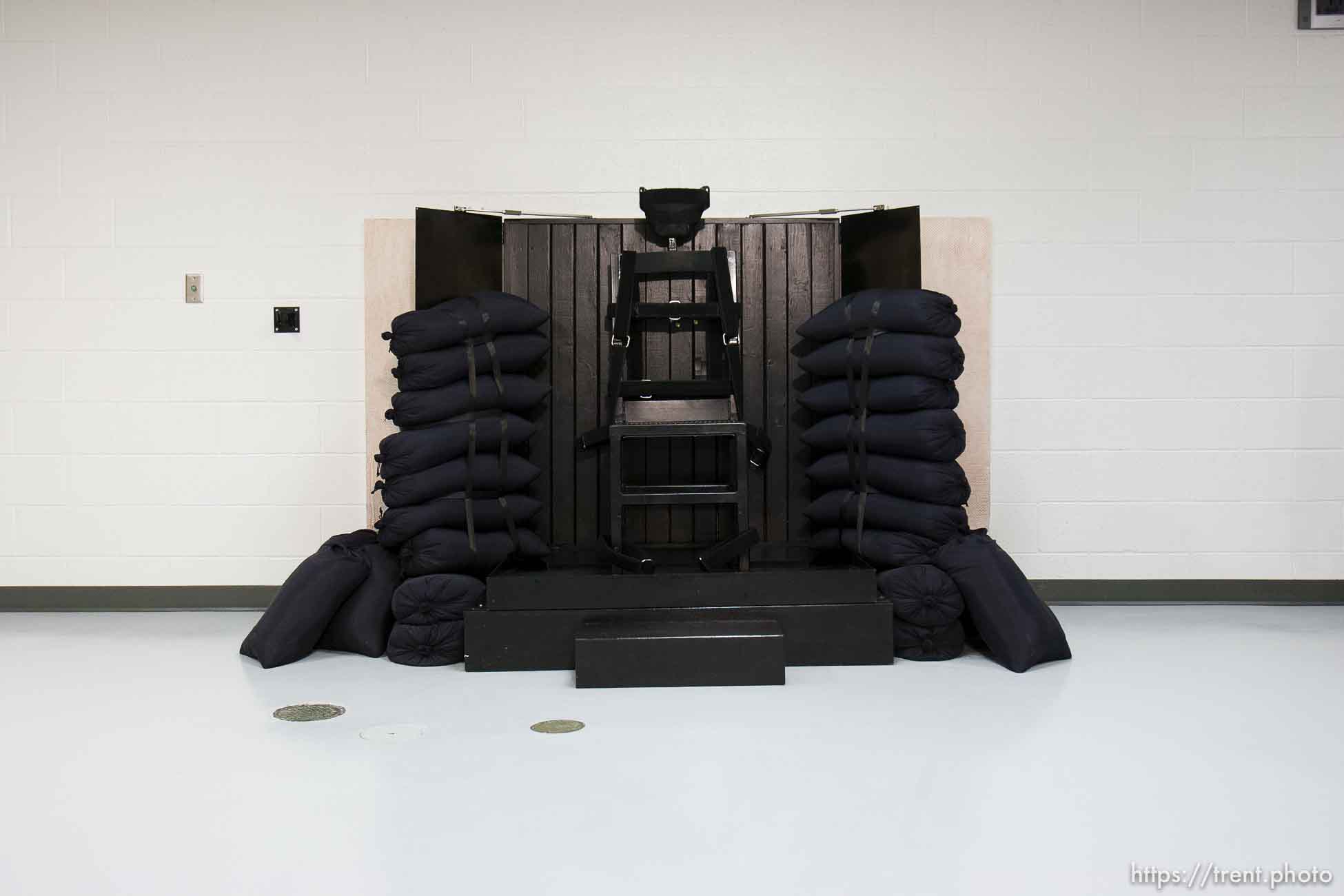 Trent Nelson  |  The Salt Lake Tribune
Draper - The execution chamber at the Utah State Prison after Ronnie Lee Gardner was executed by firing squad Friday, June 18, 2010. Four bullet holes are visible in the wood panel behind the chair. Gardner was convicted of aggravated murder, a capital felony, in 1985.