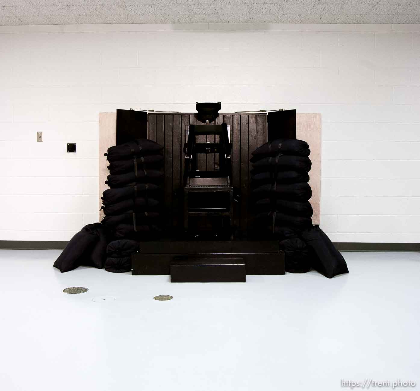 Trent Nelson  |  The Salt Lake Tribune
Draper - The execution chamber at the Utah State Prison after Ronnie Lee Gardner was executed by firing squad Friday, June 18, 2010. Four bullet holes are visible in the wood panel behind the chair. Gardner was convicted of aggravated murder, a capital felony, in 1985.