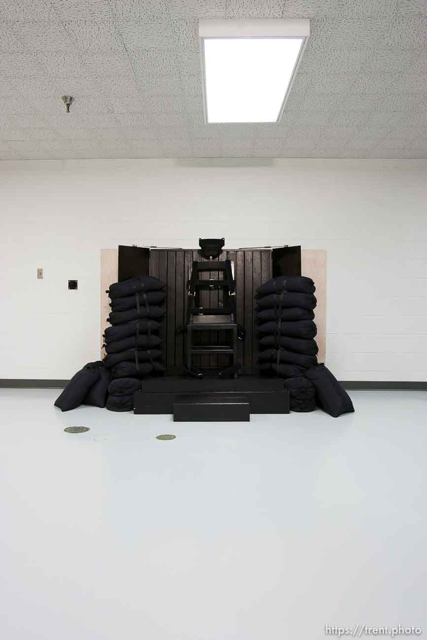 Trent Nelson  |  The Salt Lake Tribune
Draper - The execution chamber at the Utah State Prison after Ronnie Lee Gardner was executed by firing squad Friday, June 18, 2010. Four bullet holes are visible in the wood panel behind the chair. Gardner was convicted of aggravated murder, a capital felony, in 1985.