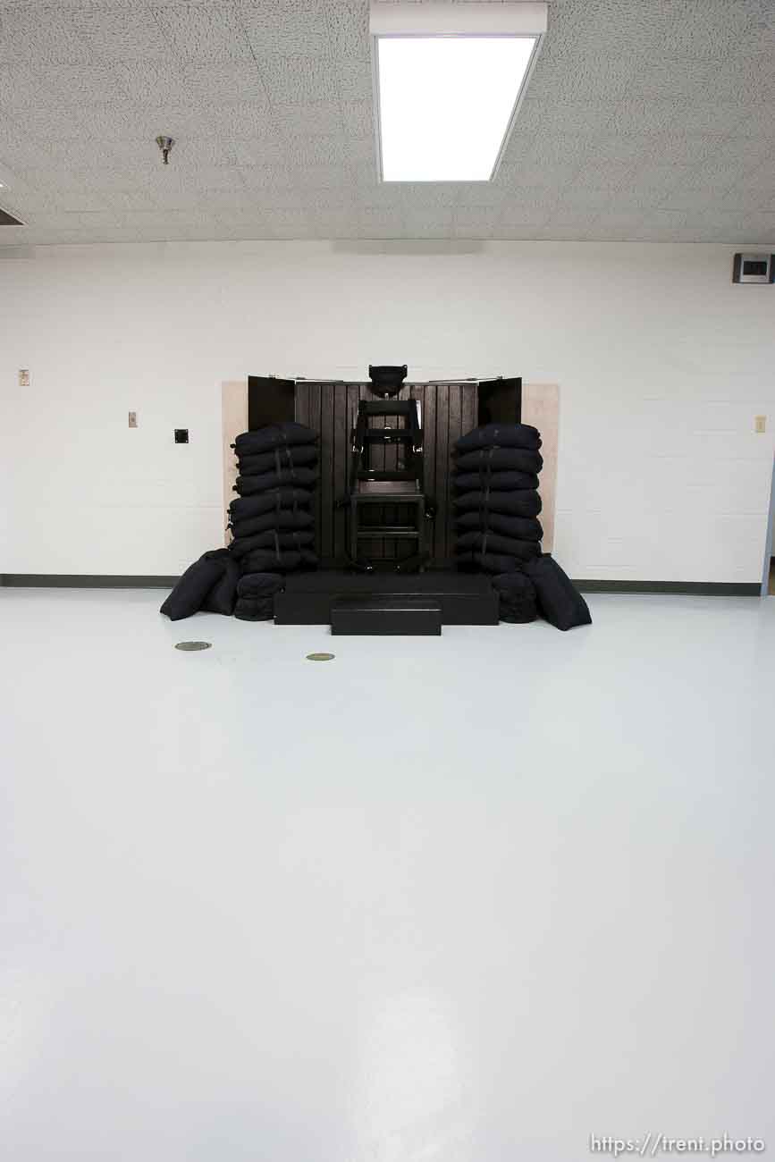 Trent Nelson  |  The Salt Lake Tribune
Draper - The execution chamber at the Utah State Prison after Ronnie Lee Gardner was executed by firing squad Friday, June 18, 2010. Four bullet holes are visible in the wood panel behind the chair. Gardner was convicted of aggravated murder, a capital felony, in 1985.