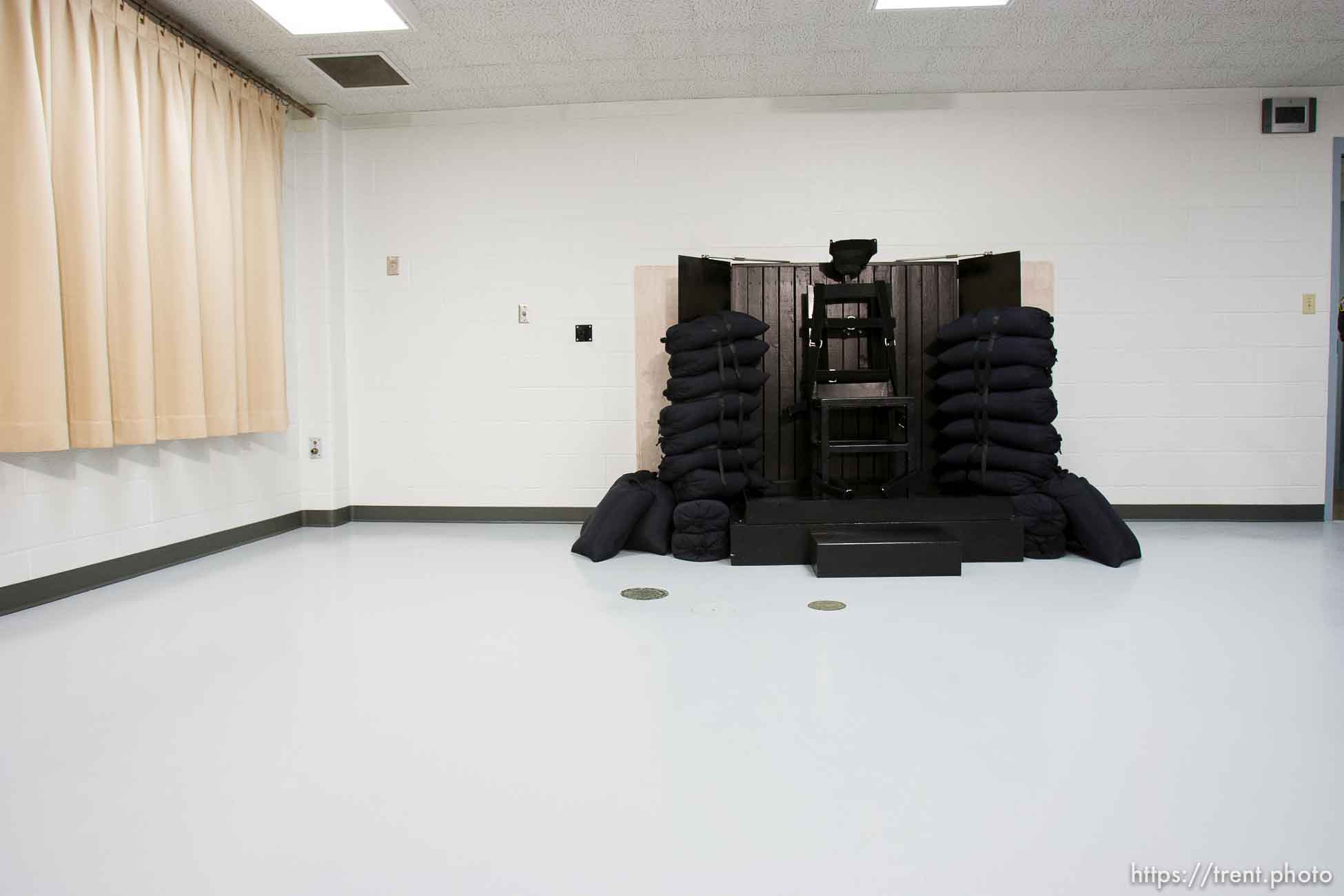 Trent Nelson  |  The Salt Lake Tribune
Draper - The execution chamber at the Utah State Prison after Ronnie Lee Gardner was executed by firing squad Friday, June 18, 2010. Four bullet holes are visible in the wood panel behind the chair. Gardner was convicted of aggravated murder, a capital felony, in 1985.