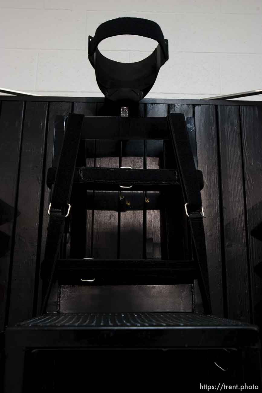 Trent Nelson  |  The Salt Lake Tribune
Draper - The execution chamber at the Utah State Prison after Ronnie Lee Gardner was executed by firing squad Friday, June 18, 2010. Four bullet holes are visible in the wood panel behind the chair. Gardner was convicted of aggravated murder, a capital felony, in 1985.