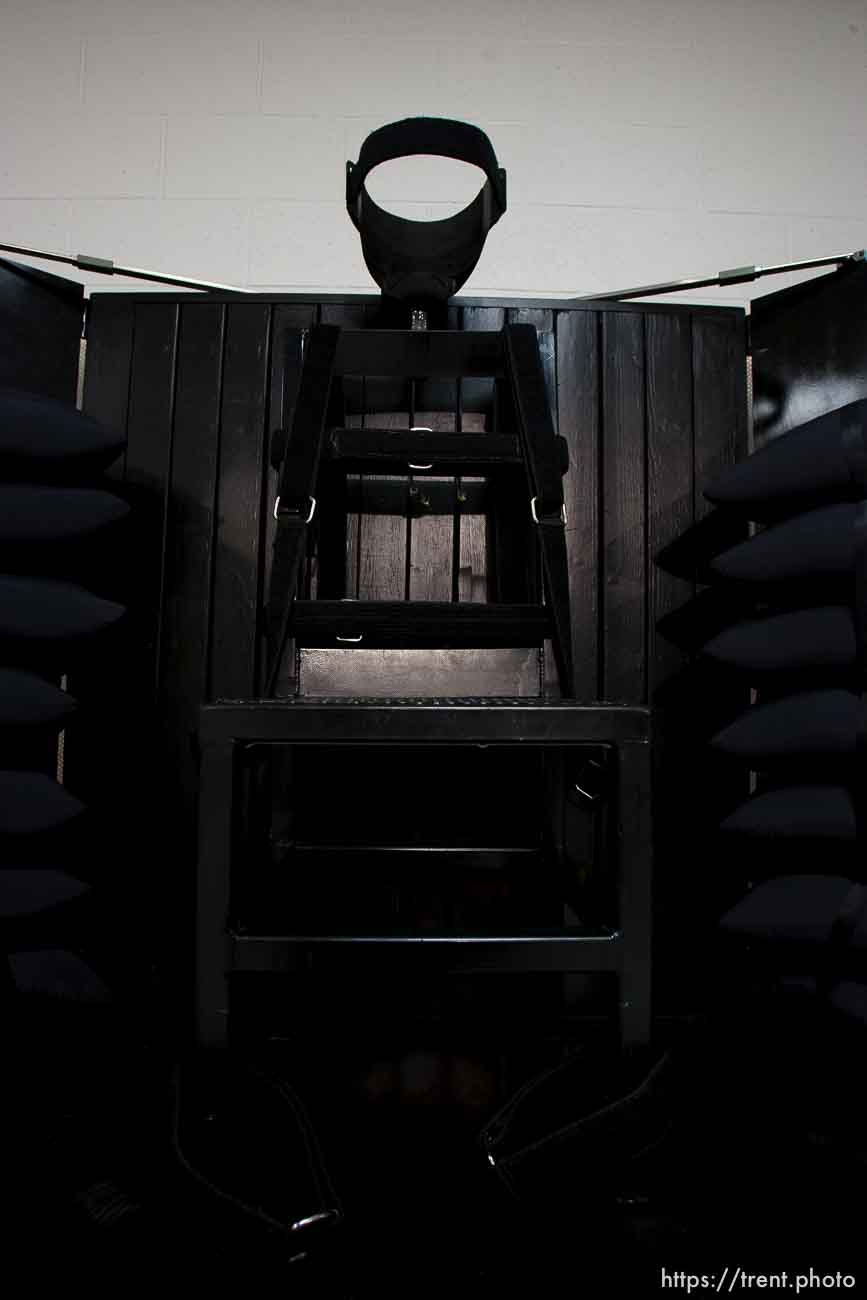 Trent Nelson  |  The Salt Lake Tribune
Draper - The execution chamber at the Utah State Prison after Ronnie Lee Gardner was executed by firing squad Friday, June 18, 2010. Four bullet holes are visible in the wood panel behind the chair. Gardner was convicted of aggravated murder, a capital felony, in 1985.