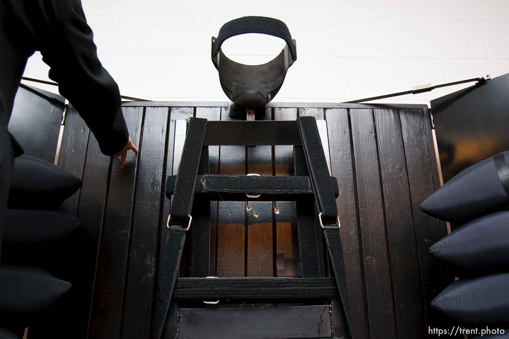 Trent Nelson  |  The Salt Lake Tribune
Draper - The execution chamber at the Utah State Prison after Ronnie Lee Gardner was executed by firing squad Friday, June 18, 2010. Four bullet holes are visible in the wood panel behind the chair. Gardner was convicted of aggravated murder, a capital felony, in 1985.