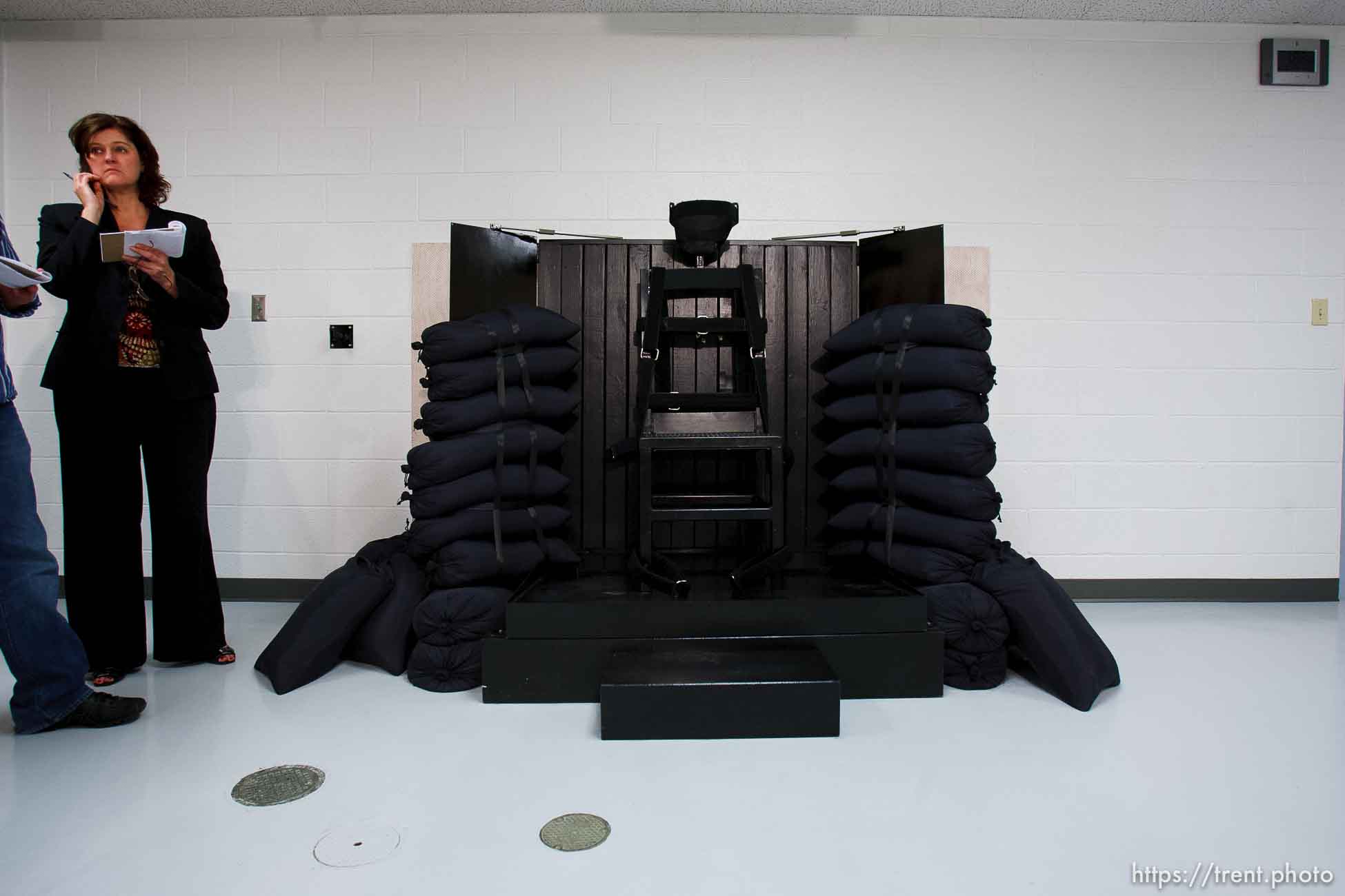 Trent Nelson  |  The Salt Lake Tribune
Draper - The execution chamber at the Utah State Prison after Ronnie Lee Gardner was executed by firing squad Friday, June 18, 2010. Four bullet holes are visible in the wood panel behind the chair. Gardner was convicted of aggravated murder, a capital felony, in 1985. jennifer dobner