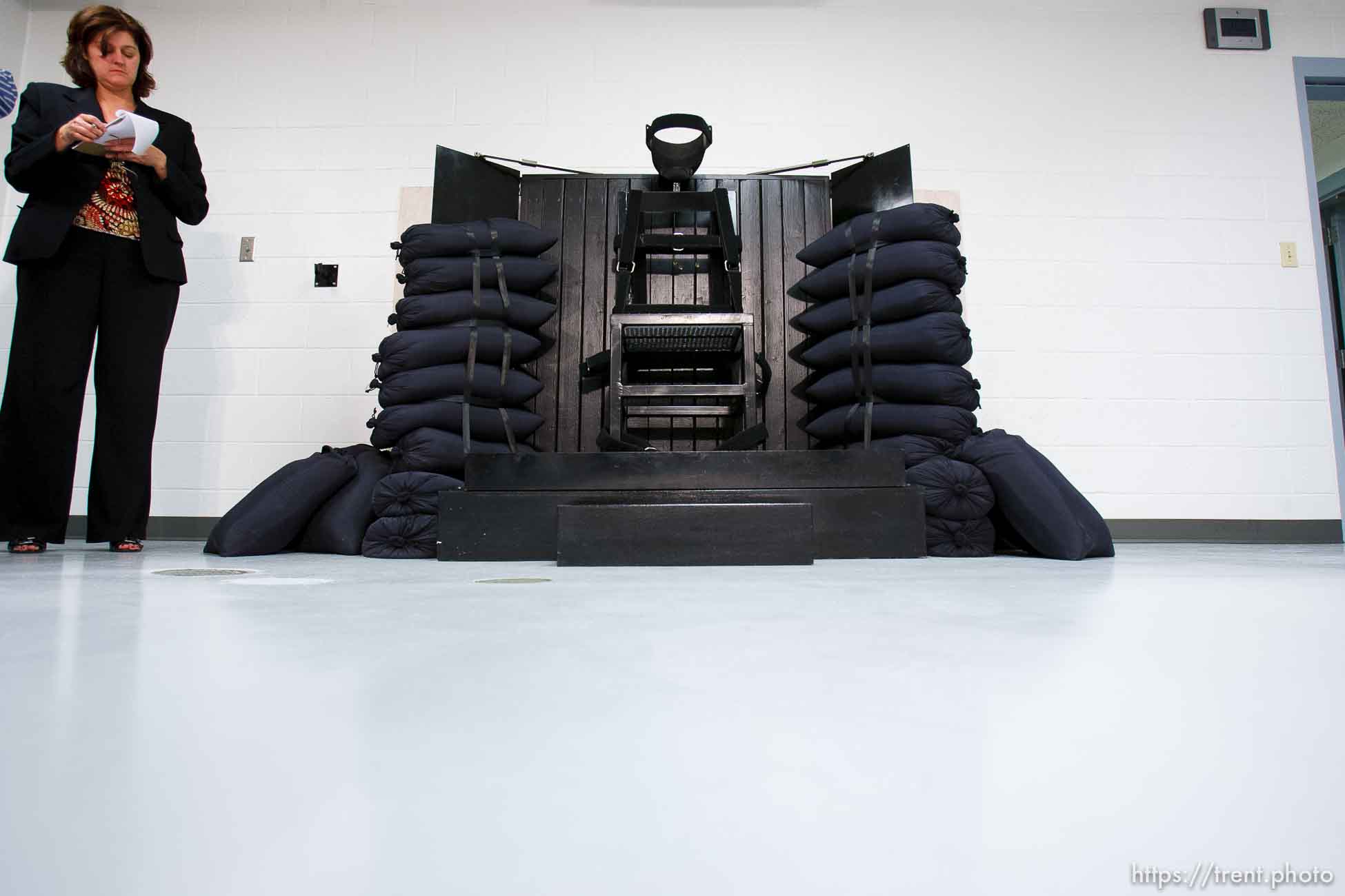 Trent Nelson  |  The Salt Lake Tribune
Draper - The execution chamber at the Utah State Prison after Ronnie Lee Gardner was executed by firing squad Friday, June 18, 2010. Four bullet holes are visible in the wood panel behind the chair. Gardner was convicted of aggravated murder, a capital felony, in 1985. jennifer dobner