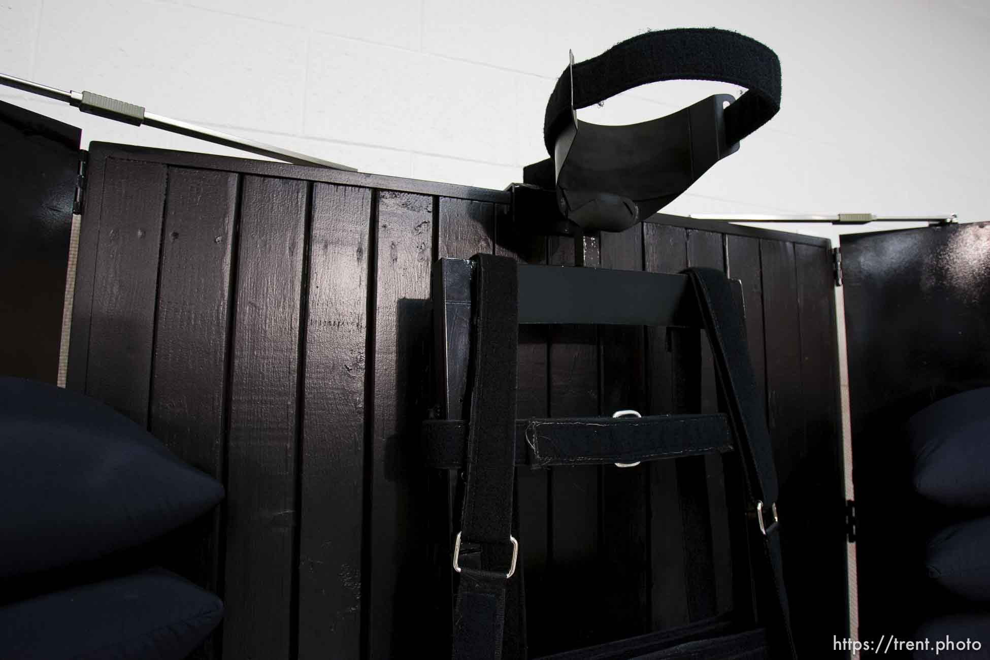 Trent Nelson  |  The Salt Lake Tribune
Draper - The execution chamber at the Utah State Prison after Ronnie Lee Gardner was executed by firing squad Friday, June 18, 2010. Four bullet holes are visible in the wood panel behind the chair. Gardner was convicted of aggravated murder, a capital felony, in 1985.