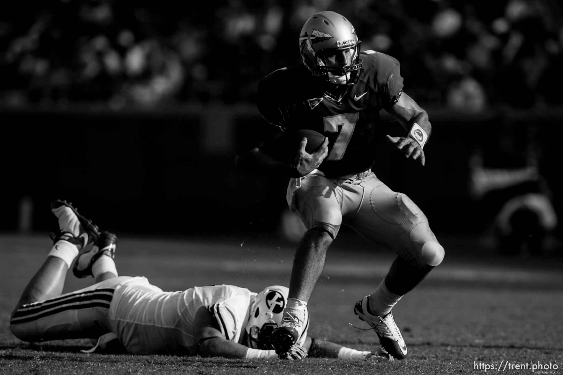 Trent Nelson  |  The Salt Lake Tribune
Florida State quarterback Christian Ponder runs away from BYU defensive lineman Matt Putnam (41) in the second half, BYU vs. Florida State, college football Saturday, September 18, 2010 at Doak Campbell Stadium in Tallahassee, Florida.