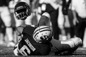 Trent Nelson  |  The Salt Lake Tribune
BYU receiver McKay Jacobson (6) pulls in a pass while Nevada's Kevin Grimes loses his helmet defending during the second quarter, BYU vs. Nevada, college football Saturday, September 25, 2010 at LaVell Edwards Stadium in Provo.