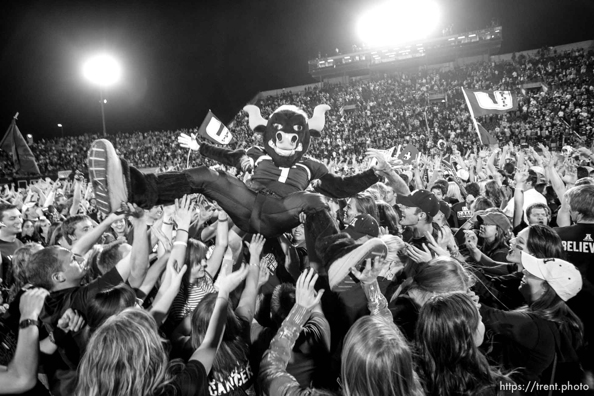 Trent Nelson  |  The Salt Lake Tribune
Utah State's mascot Big Blue surfs a crowd of fans who rushed the field as time ran out and Utah State defeated BYU 31-16. Utah State vs. BYU college football in Logan Friday, October 1, 2010.