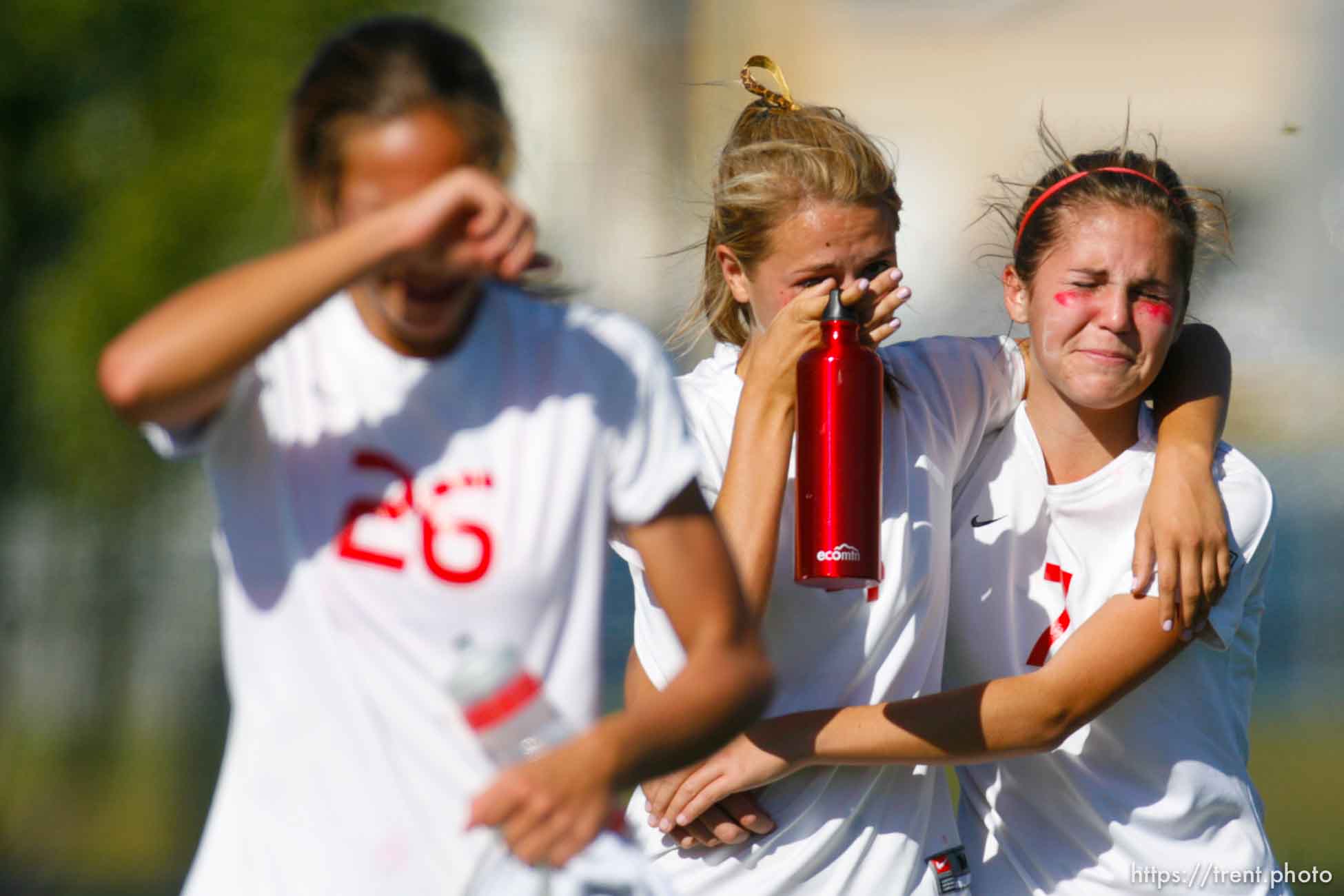 Trent Nelson  |  The Salt Lake Tribune
East's Tobin Neibrugge (26), Sarah Skanchy (4) and Brynne Orton (7) after Bonneville defeated East high school 1-0, 4A girls' soccer state championships semifinals at Juan Diego High School Tuesday, October 19, 2010