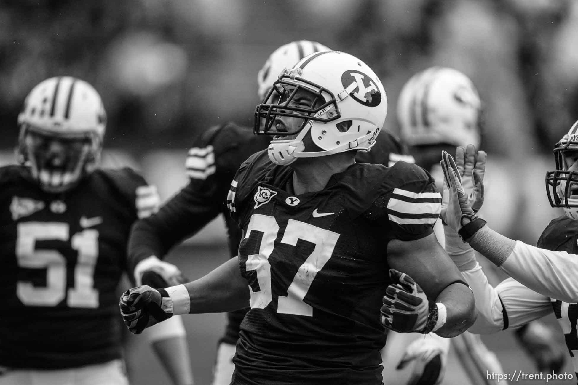 Trent Nelson  |  The Salt Lake Tribune
BYU defensive lineman Vic So'oto (37) celebrates a defensive stop in the first quarter. BYU vs. Wyoming, college football Saturday, October 23, 2010 at LaVell Edwards Stadium in Provo.