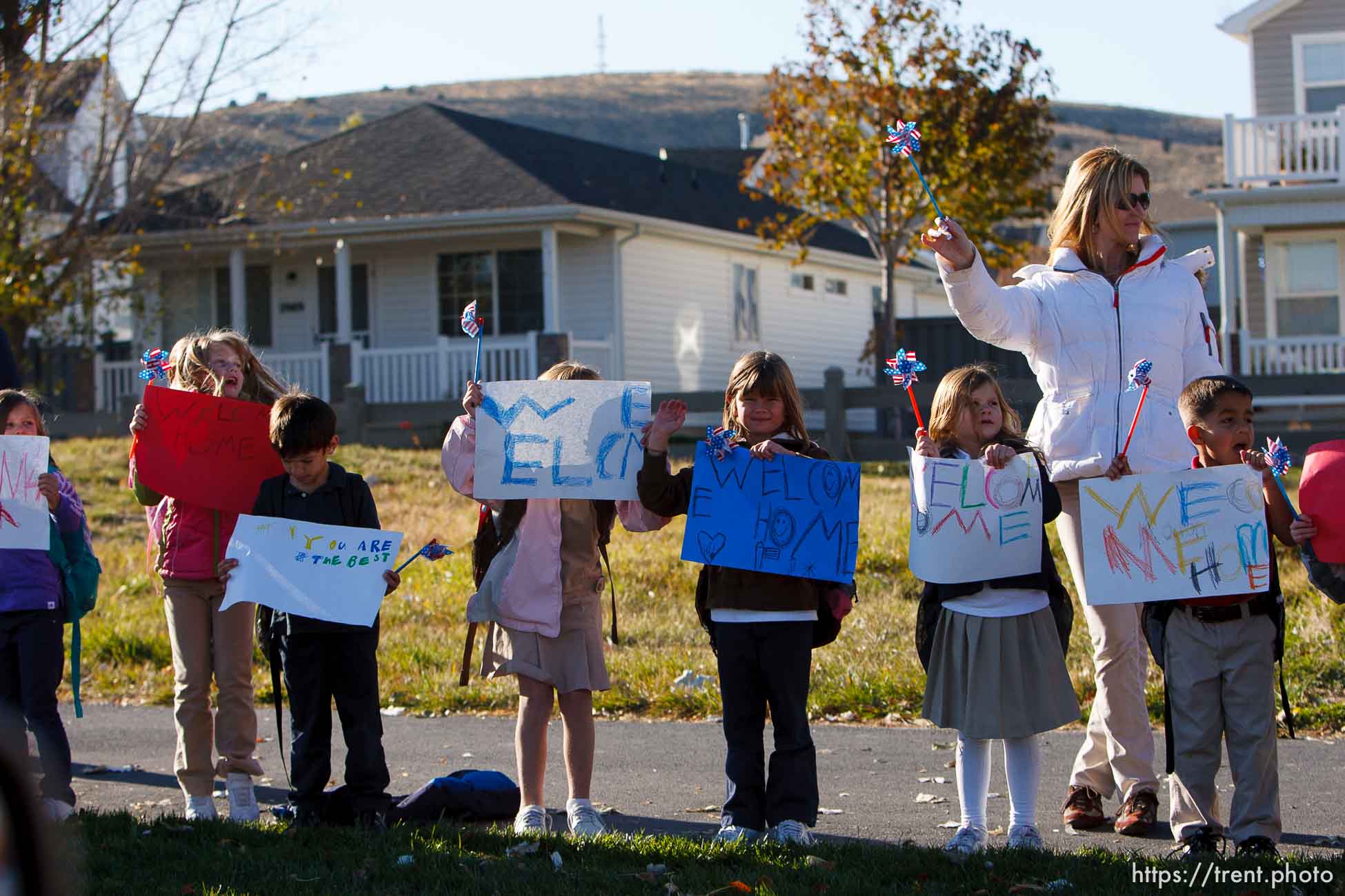 Trent Nelson  |  The Salt Lake Tribune
SFC Mike Jones, Utah National Guard, was welcomed home to Eagle Mountain by family, friends and neighbors who lined the streets of Eagle Mountain Friday, November 12, 2010. On his fourth deployment, Jones was injured in Afghanistan in September.