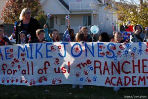 Trent Nelson  |  The Salt Lake Tribune
SFC Mike Jones, Utah National Guard, was welcomed home to Eagle Mountain by family, friends and neighbors who lined the streets of Eagle Mountain Friday, November 12, 2010. On his fourth deployment, Jones was injured in Afghanistan in September.