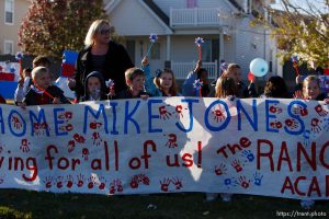 Trent Nelson  |  The Salt Lake Tribune
SFC Mike Jones, Utah National Guard, was welcomed home to Eagle Mountain by family, friends and neighbors who lined the streets of Eagle Mountain Friday, November 12, 2010. On his fourth deployment, Jones was injured in Afghanistan in September.