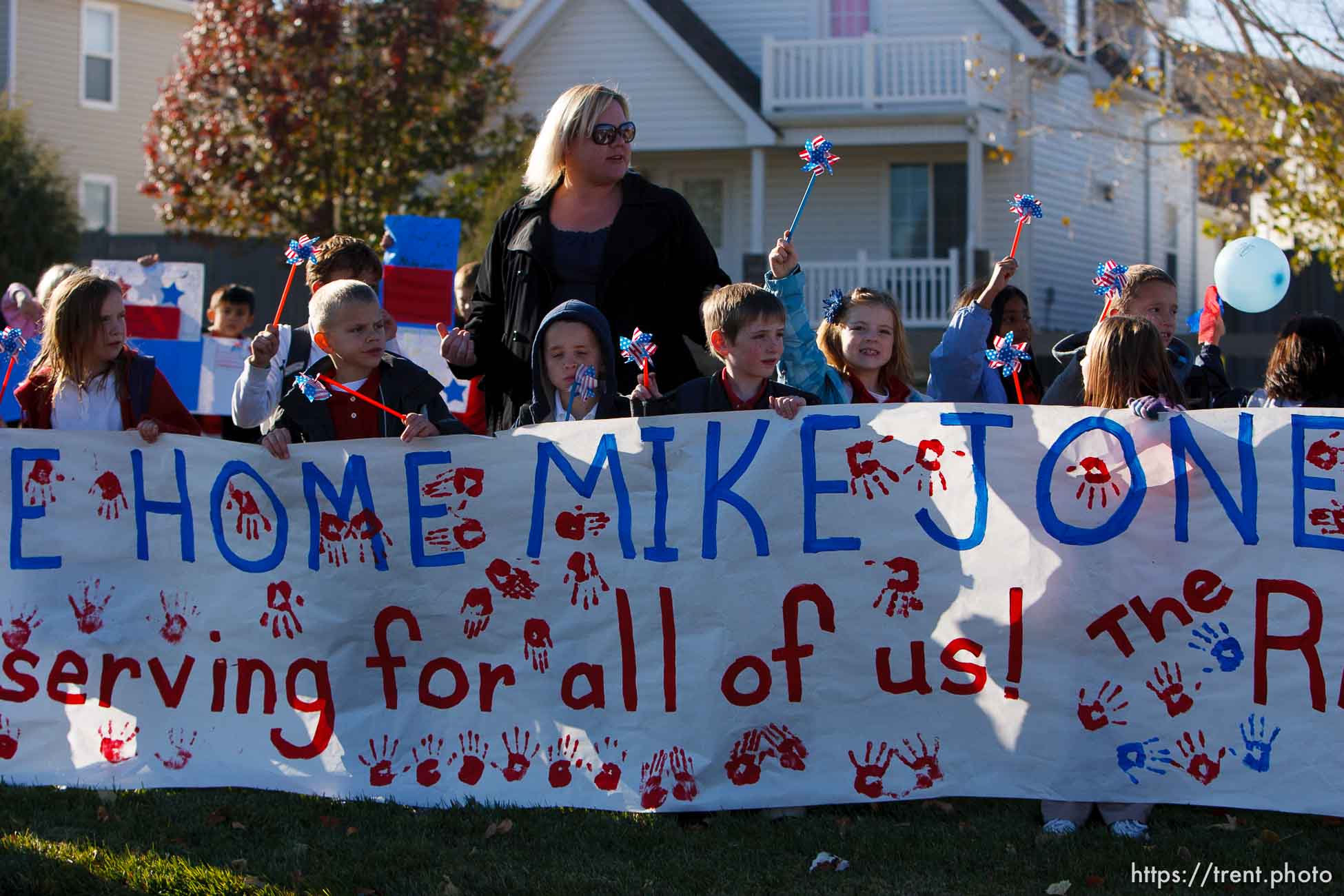 Trent Nelson  |  The Salt Lake Tribune
SFC Mike Jones, Utah National Guard, was welcomed home to Eagle Mountain by family, friends and neighbors who lined the streets of Eagle Mountain Friday, November 12, 2010. On his fourth deployment, Jones was injured in Afghanistan in September.