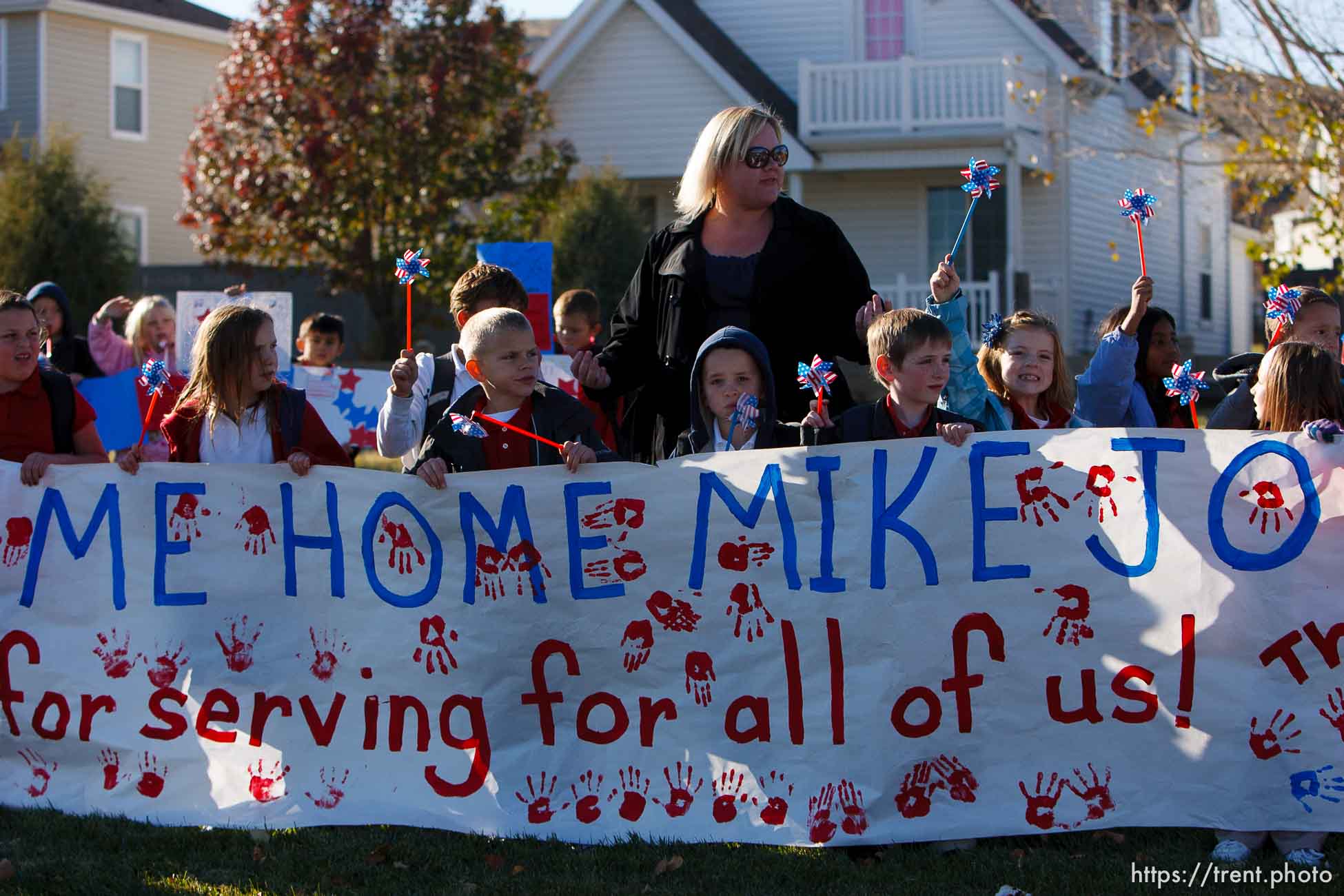 Trent Nelson  |  The Salt Lake Tribune
SFC Mike Jones, Utah National Guard, was welcomed home to Eagle Mountain by family, friends and neighbors who lined the streets of Eagle Mountain Friday, November 12, 2010. On his fourth deployment, Jones was injured in Afghanistan in September.