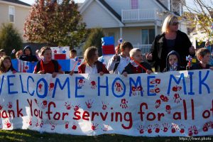 Trent Nelson  |  The Salt Lake Tribune
SFC Mike Jones, Utah National Guard, was welcomed home to Eagle Mountain by family, friends and neighbors who lined the streets of Eagle Mountain Friday, November 12, 2010. On his fourth deployment, Jones was injured in Afghanistan in September.