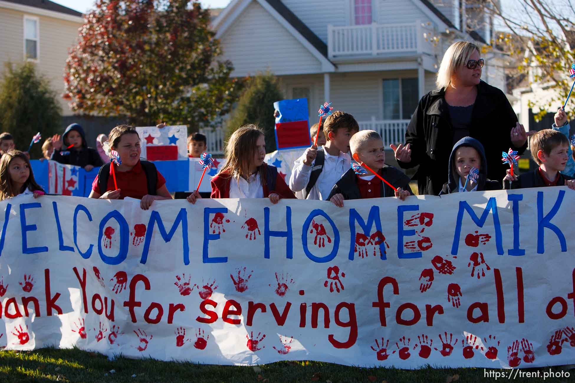 Trent Nelson  |  The Salt Lake Tribune
SFC Mike Jones, Utah National Guard, was welcomed home to Eagle Mountain by family, friends and neighbors who lined the streets of Eagle Mountain Friday, November 12, 2010. On his fourth deployment, Jones was injured in Afghanistan in September.