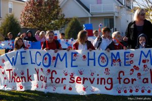 Trent Nelson  |  The Salt Lake Tribune
SFC Mike Jones, Utah National Guard, was welcomed home to Eagle Mountain by family, friends and neighbors who lined the streets of Eagle Mountain Friday, November 12, 2010. On his fourth deployment, Jones was injured in Afghanistan in September.